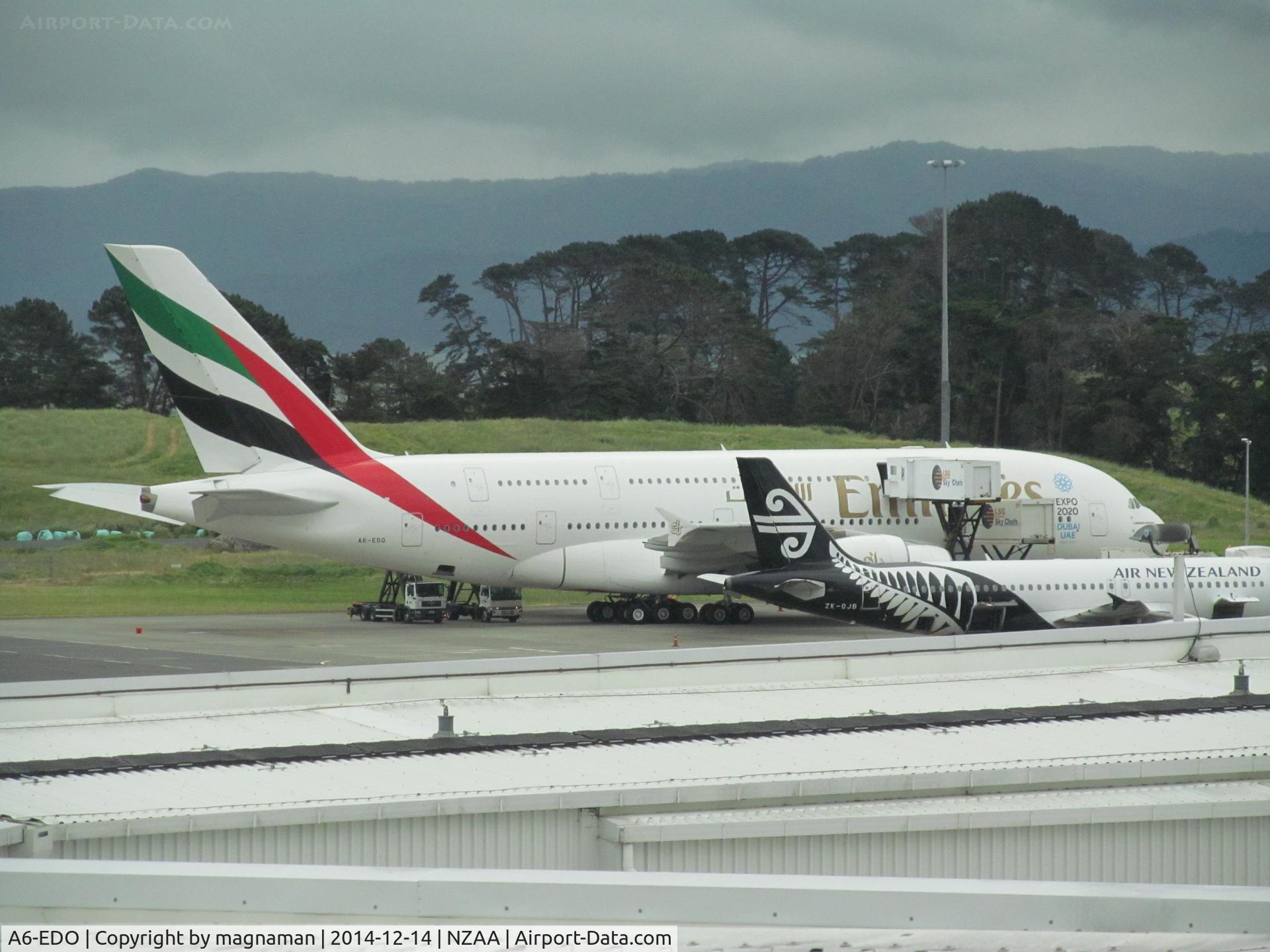 A6-EDO, 2010 Airbus A380-861 C/N 057, on apron - taken through glass from observation gallery