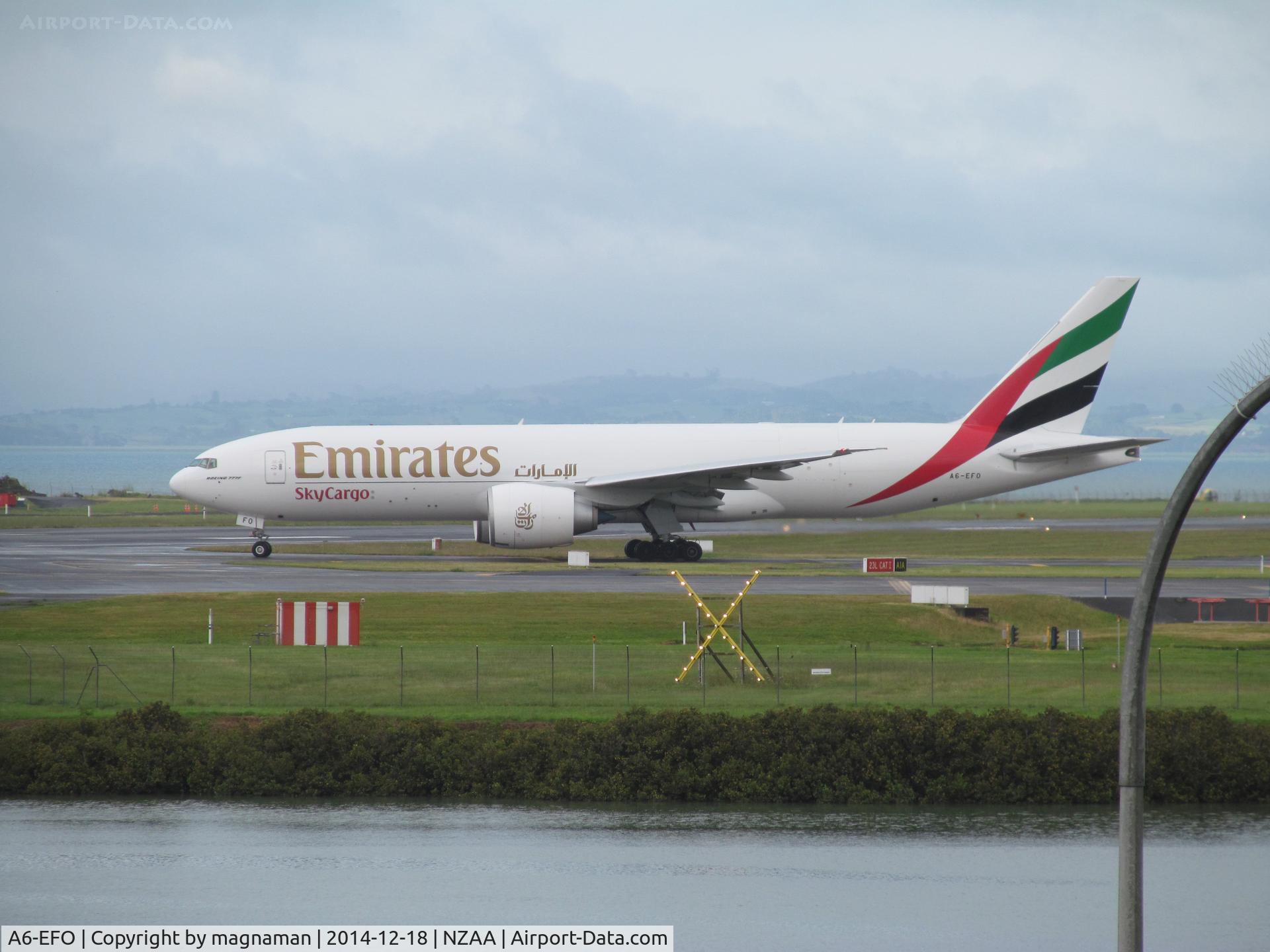 A6-EFO, 2014 Boeing 777-F1H C/N 42233, About to leave AKL for Hong Kong having made third trip to drop Katy Perry stage equipment off for concert.