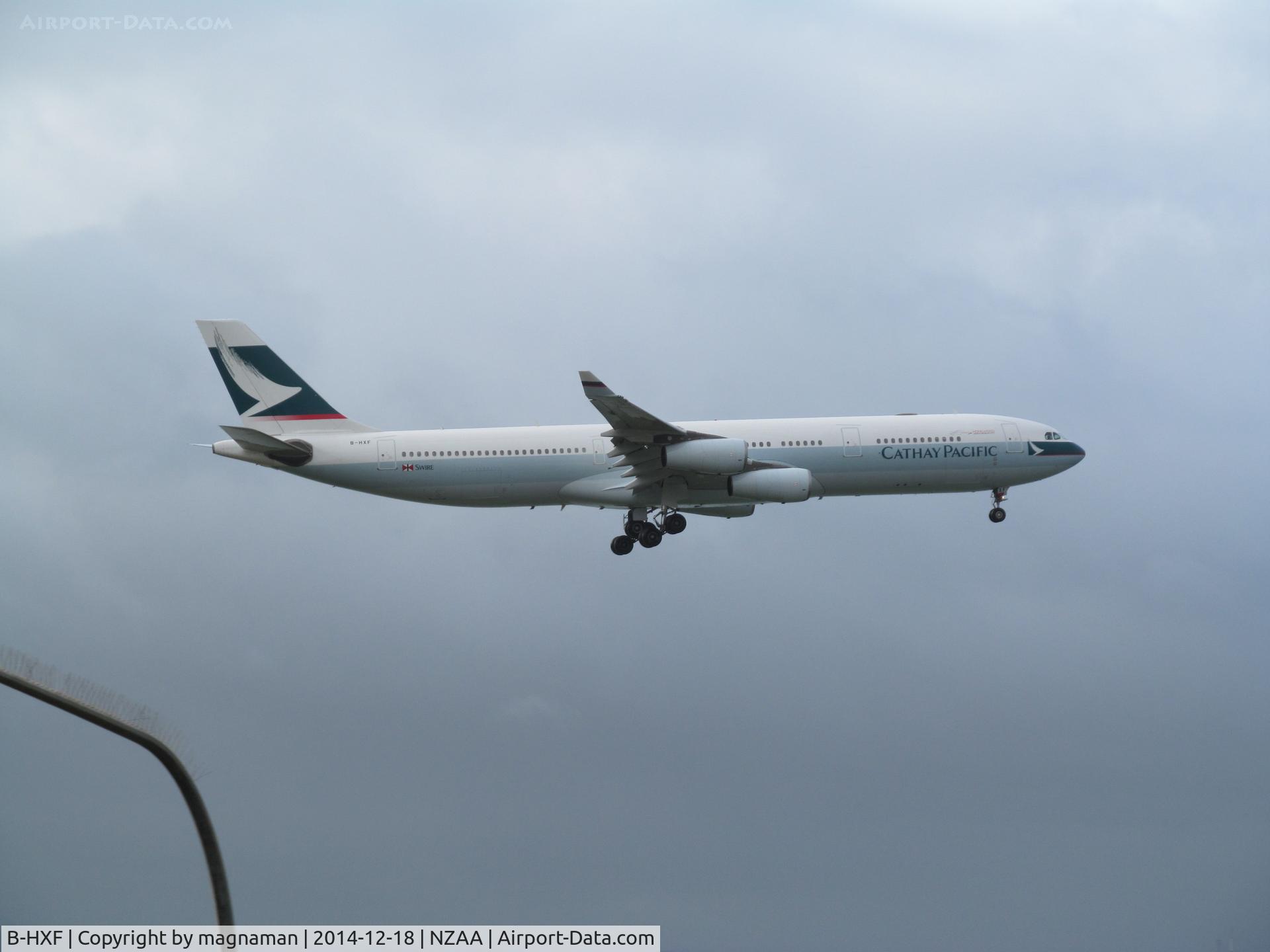 B-HXF, Airbus A340-313 C/N 160, landing at AKL - lots of street lamps to try and avoid!!