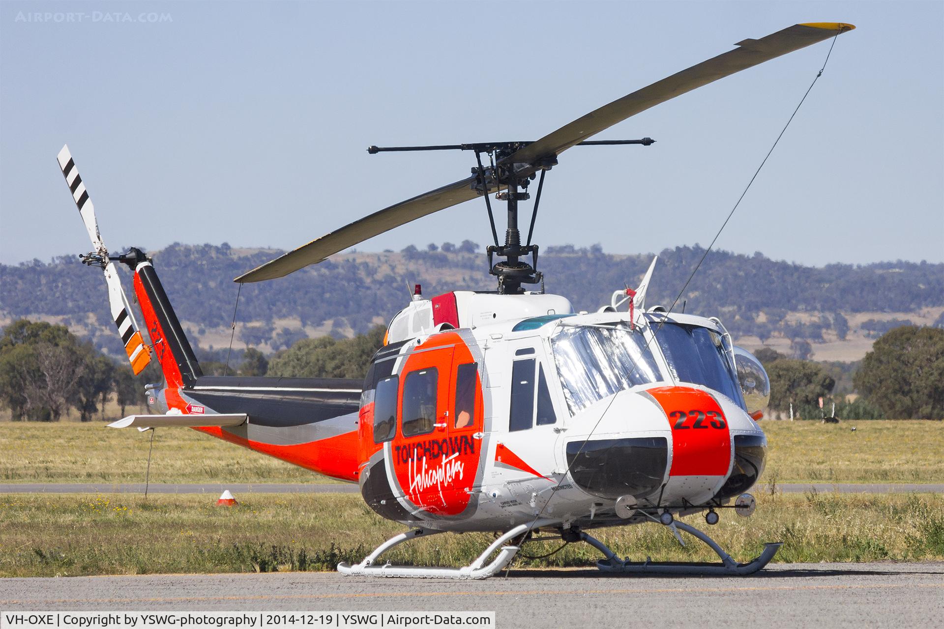 VH-OXE, 1967 Bell UH-1H Iroquois C/N 9385, Touchdown Helicopters (VH-OXE) Bell UH-1H Iroquois at Wagga Wagga Airport.