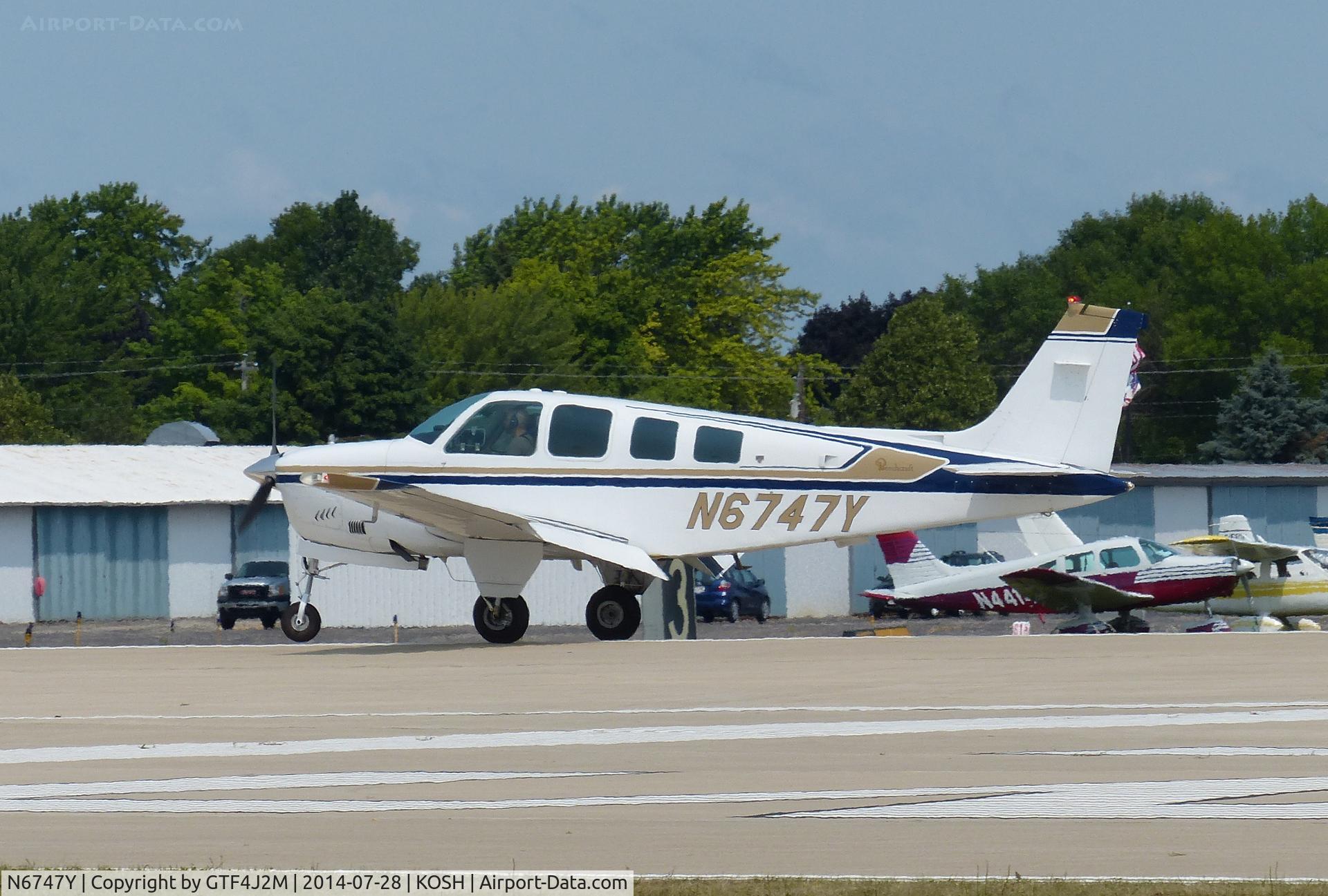 N6747Y, 1980 Beech A36 Bonanza 36 C/N E-1676, N6747Y   at Oshkosh 28.7.14