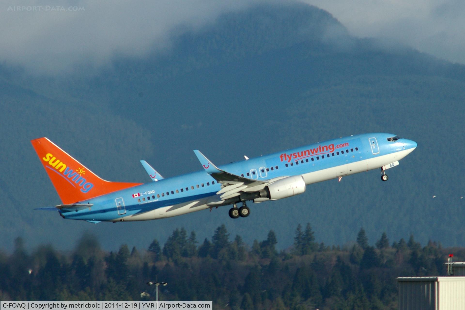 C-FOAQ, 2009 Boeing 737-8K5 C/N 35148, Taking vacationers for Christmas vacation