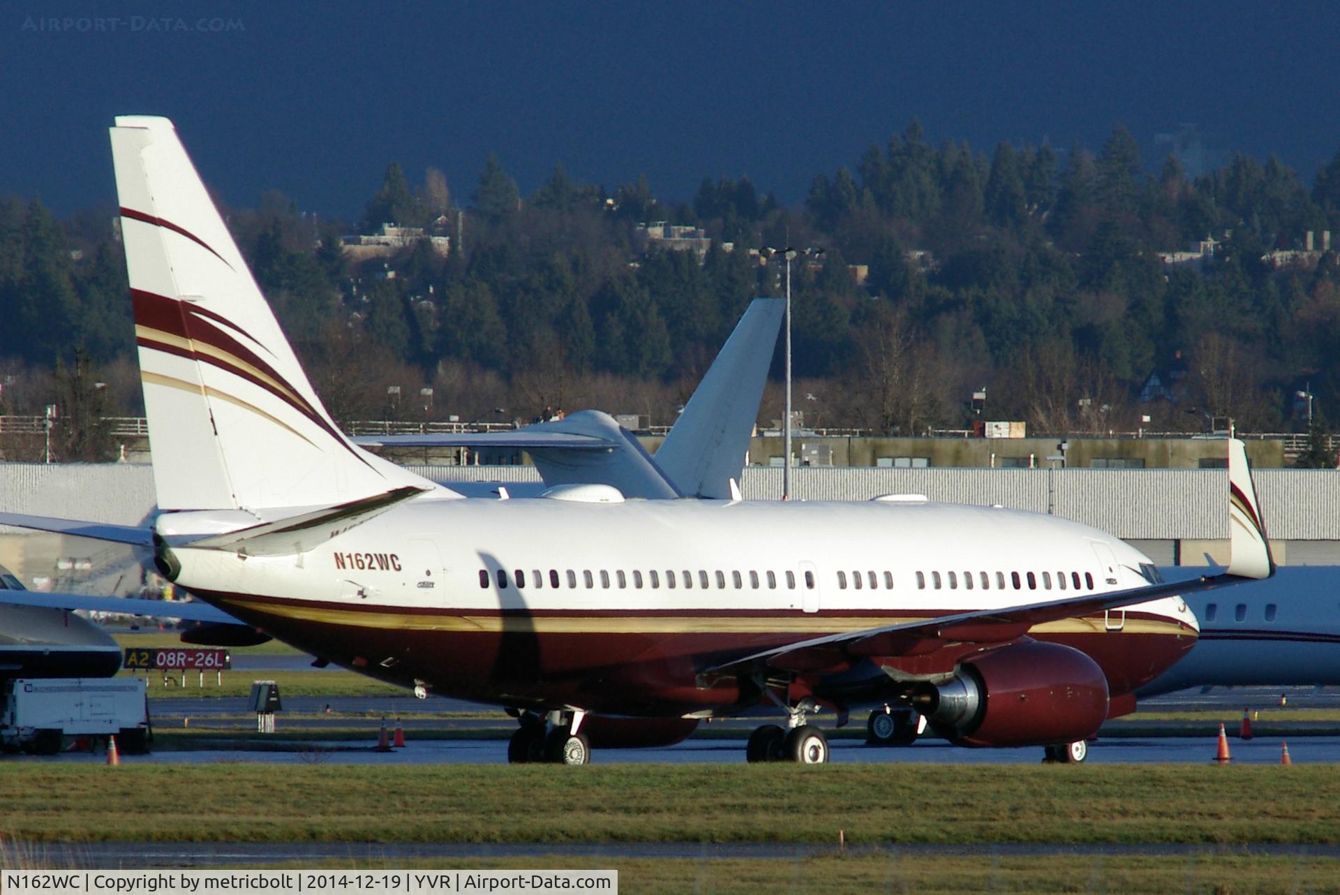 N162WC, 1999 Boeing 737-7BC C/N 30329, At YVR