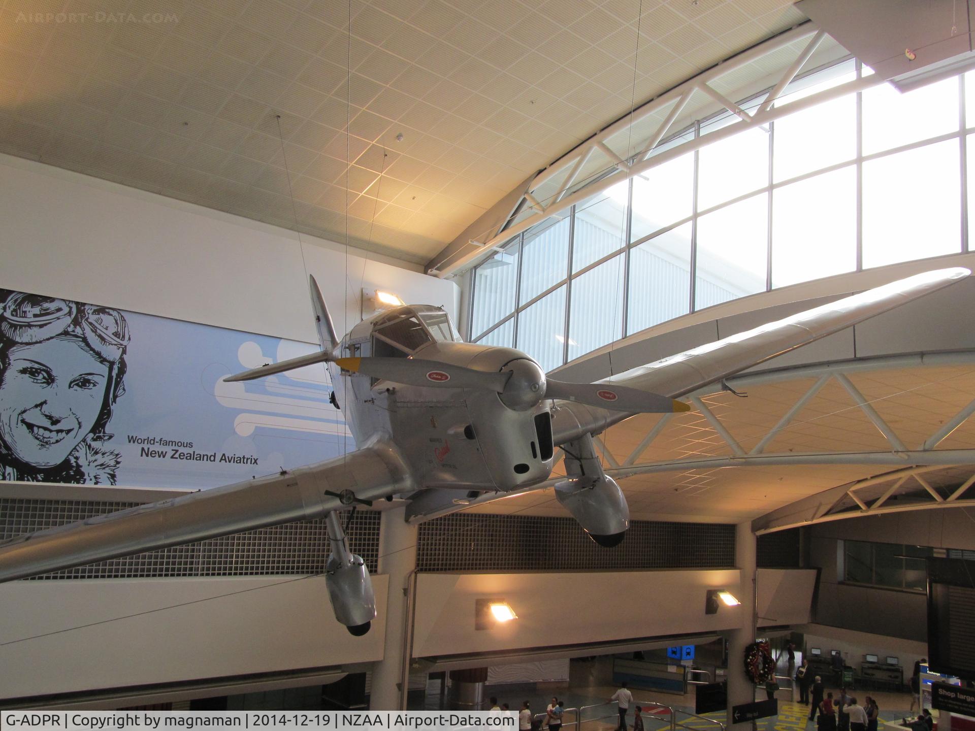 G-ADPR, 1935 Percival D-3 Gull Six (P-3) C/N D55, from top of escalator in international terminal