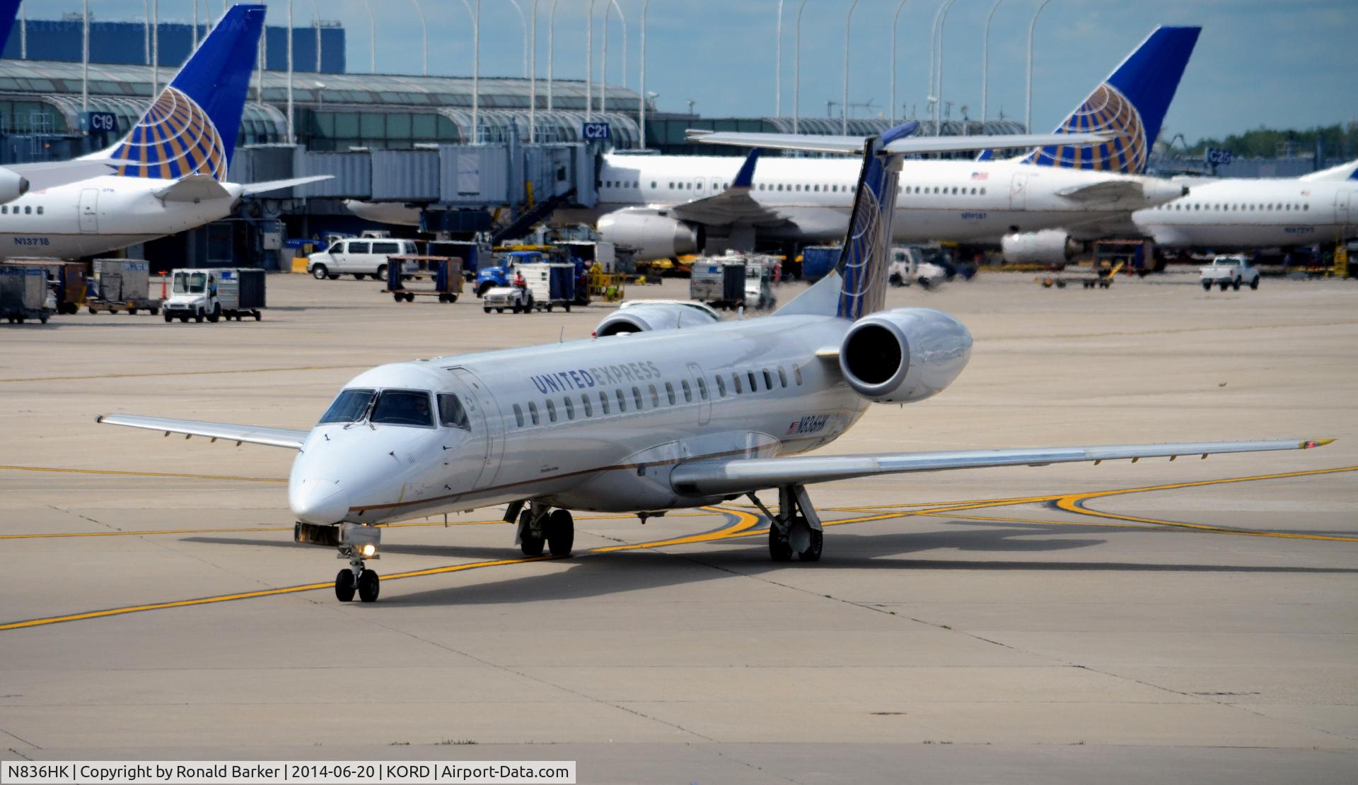 N836HK, 2003 Embraer ERJ-145LR (EMB-145LR) C/N 145695, Taxi O'Hare