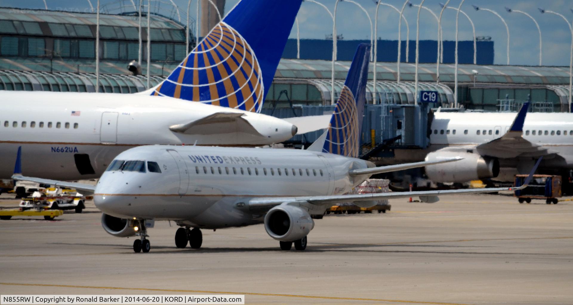N855RW, 2005 Embraer 170SE (ERJ-170-100SE) C/N 17000077, Taxi to park O'Hare
