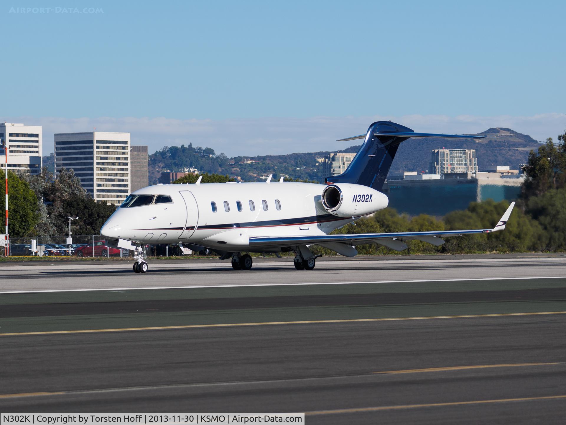 N302K, Bombardier Challenger 300 (BD-100-1A10) C/N 20267, N302K departing from RWY 21