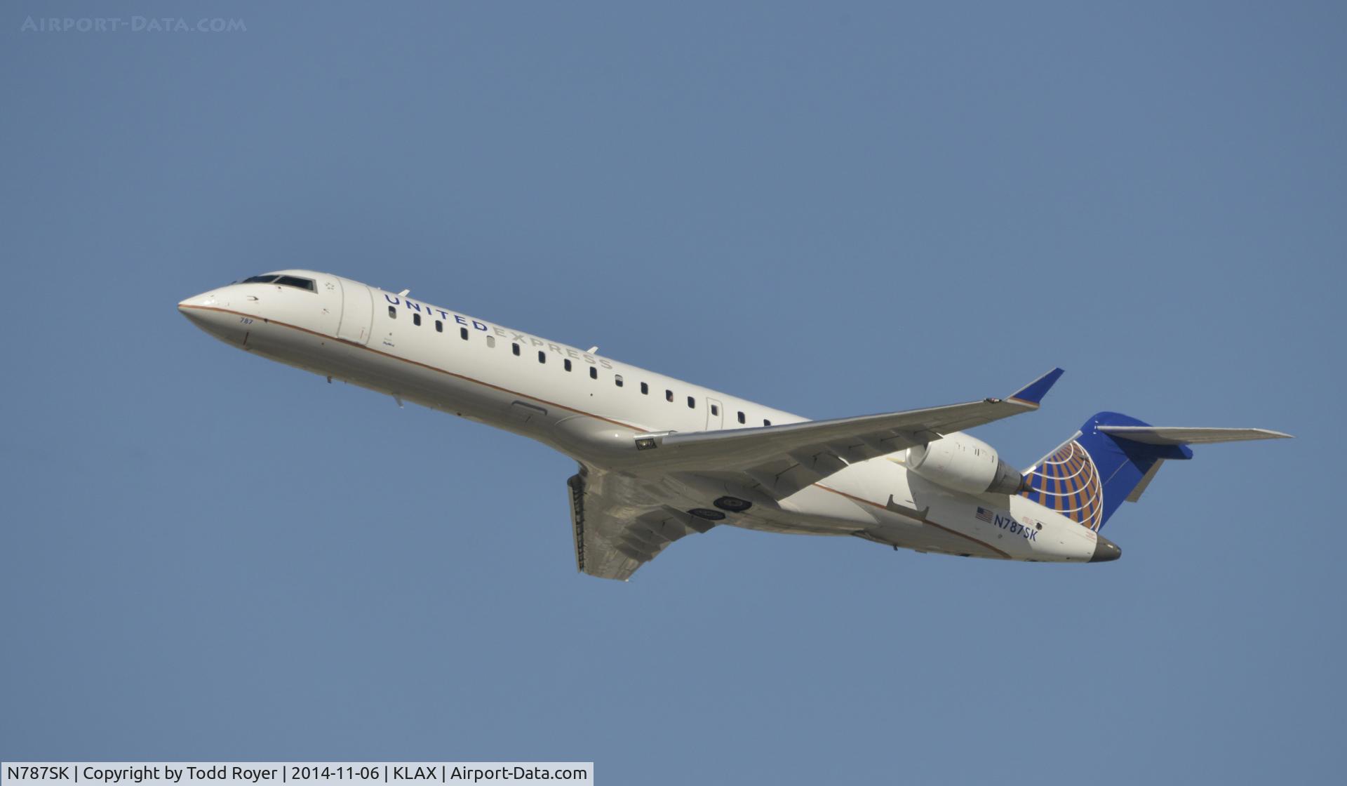 N787SK, 2009 Bombardier CRJ-700 (CL-600-2C10) Regional Jet C/N 10288, Departing LAX on 25R
