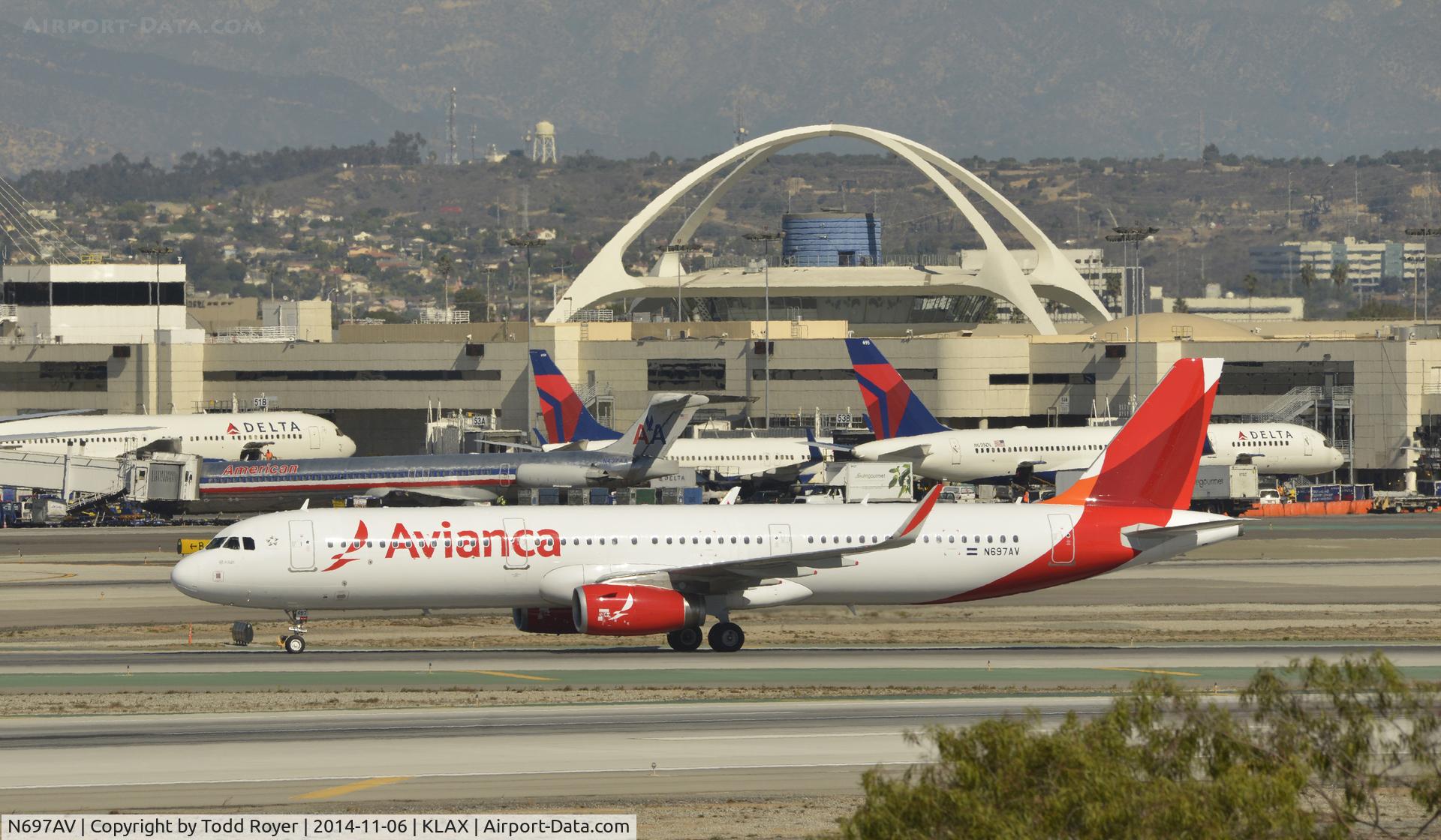 N697AV, 2014 Airbus A321-231 C/N 6190, Taxiing to gate after landing on 25L at LAX