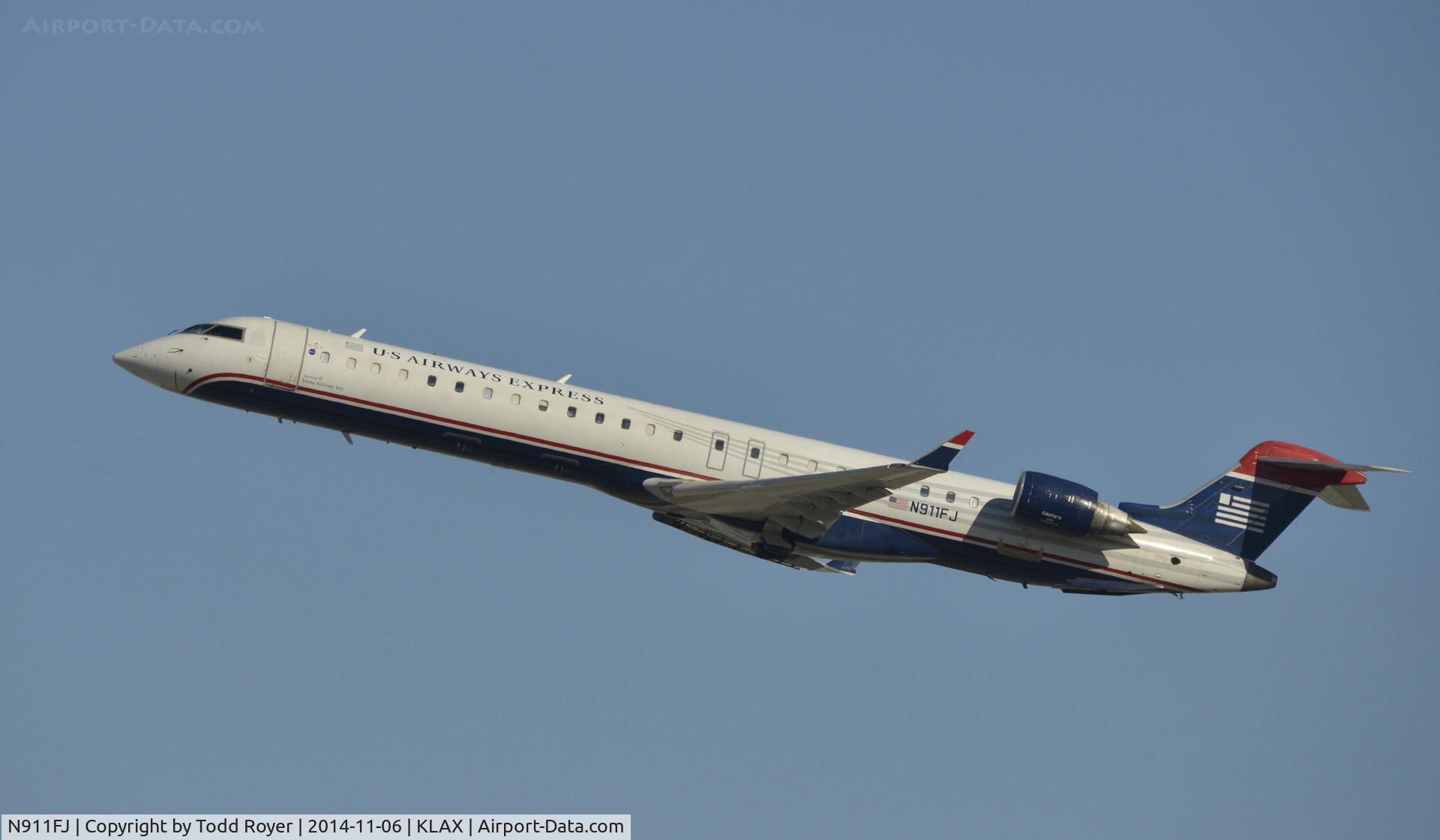 N911FJ, 2003 Bombardier CRJ-900ER (CL-600-2D24) C/N 15011, Departing LAX on 25R