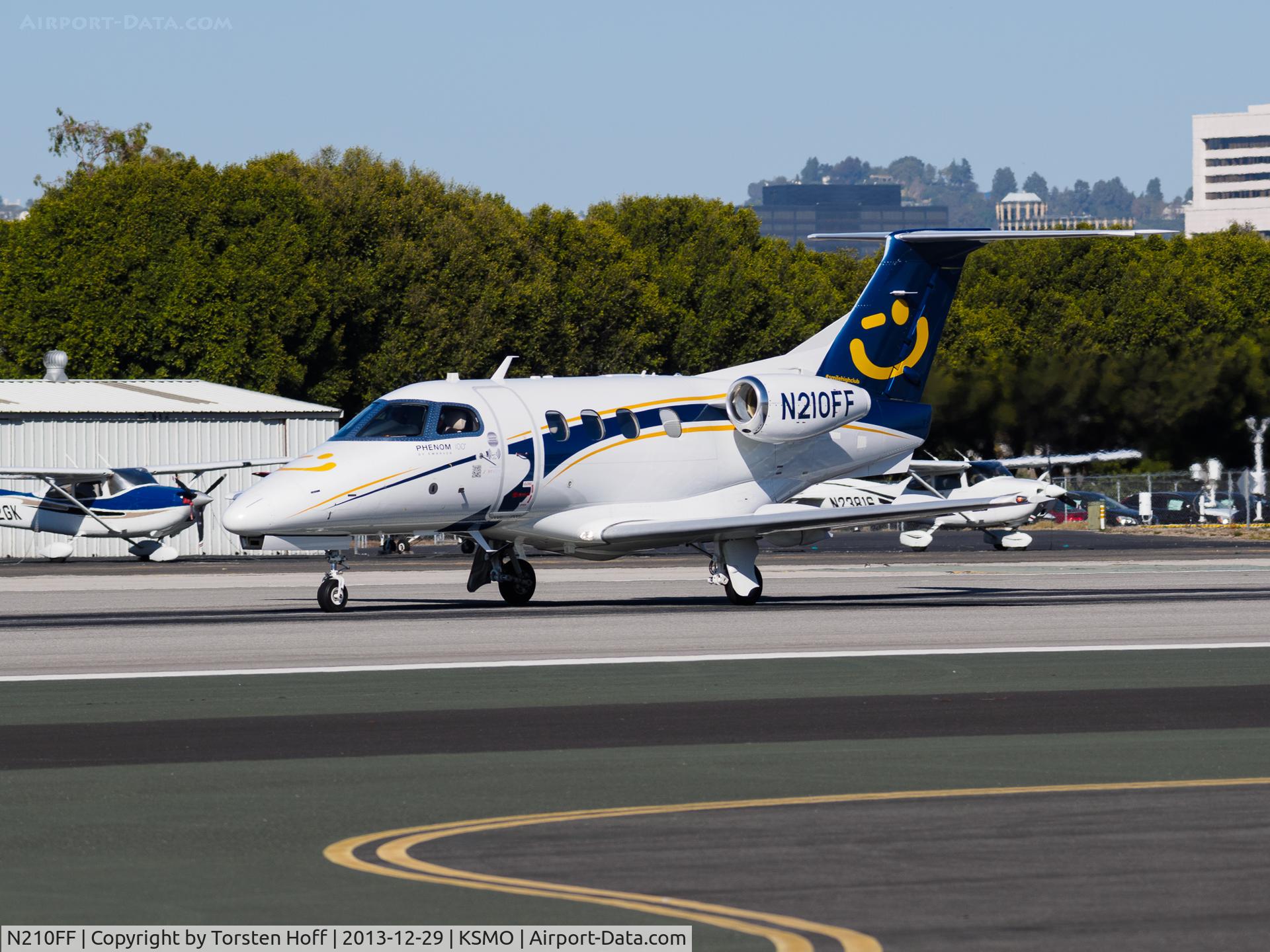 N210FF, 2009 Embraer EMB-500 Phenom 100 C/N 50000088, N210FF departing from RWY 21