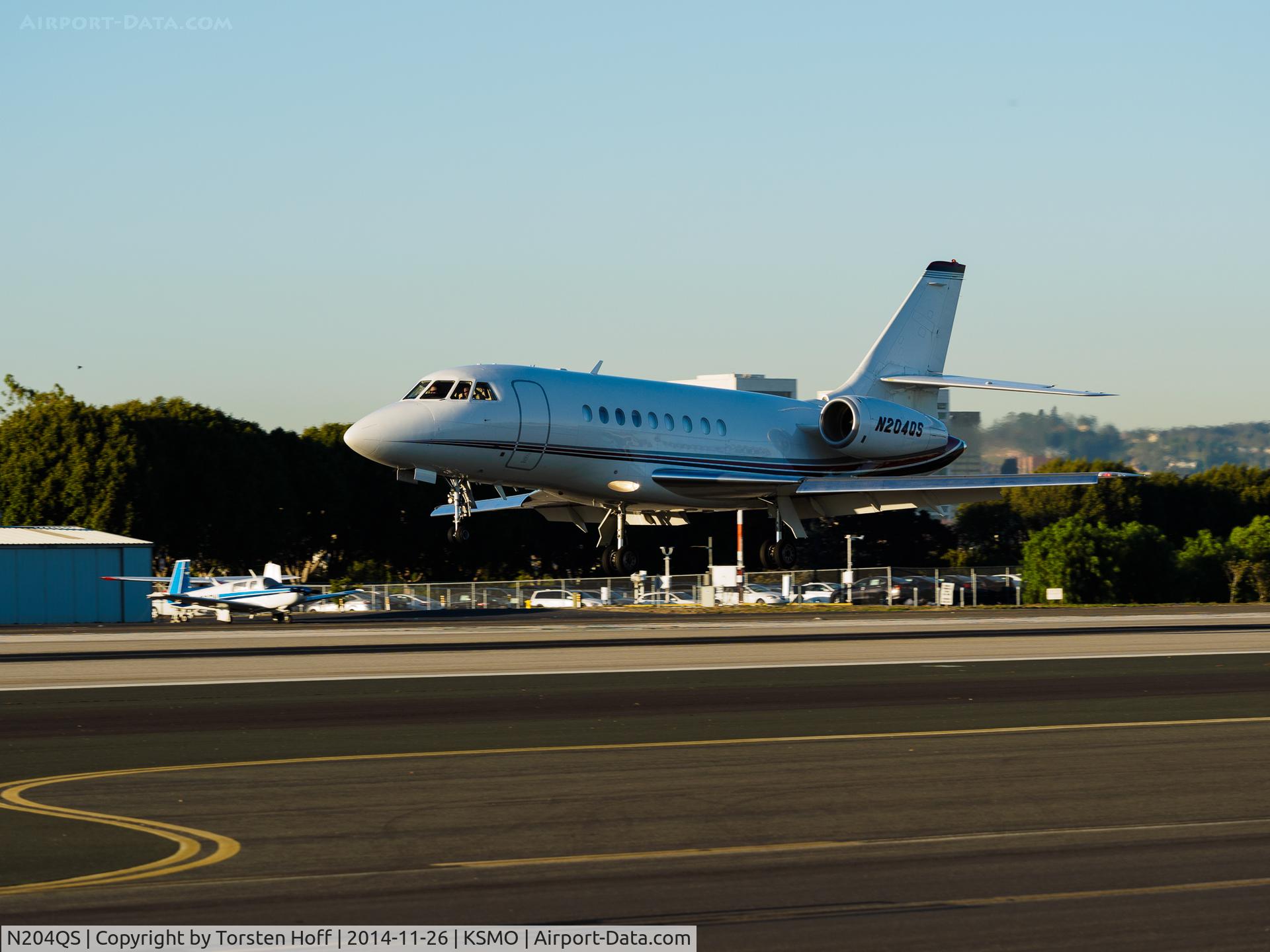 N204QS, 1999 Dassault Falcon 2000 C/N 104, N204QS arriving on RWY 21