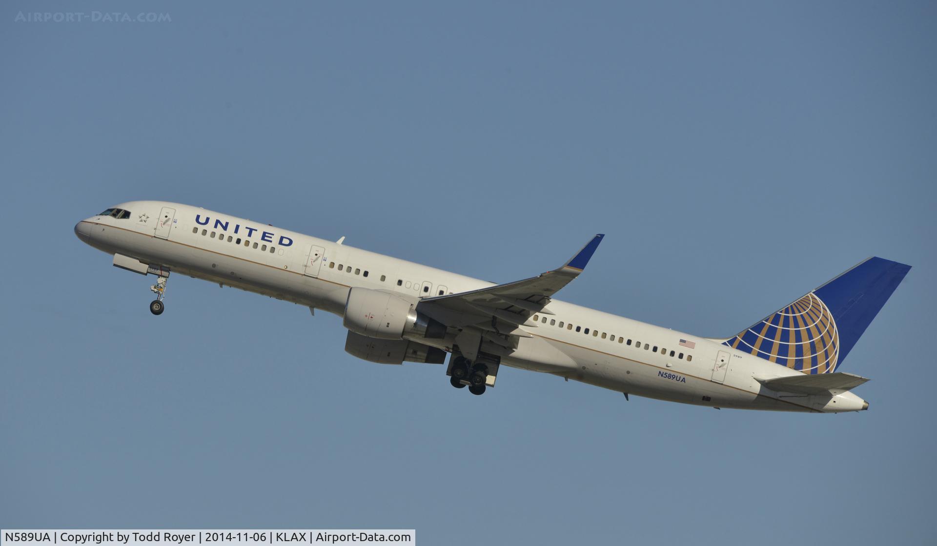 N589UA, 1997 Boeing 757-222 C/N 28707, Departing LAX on 25R