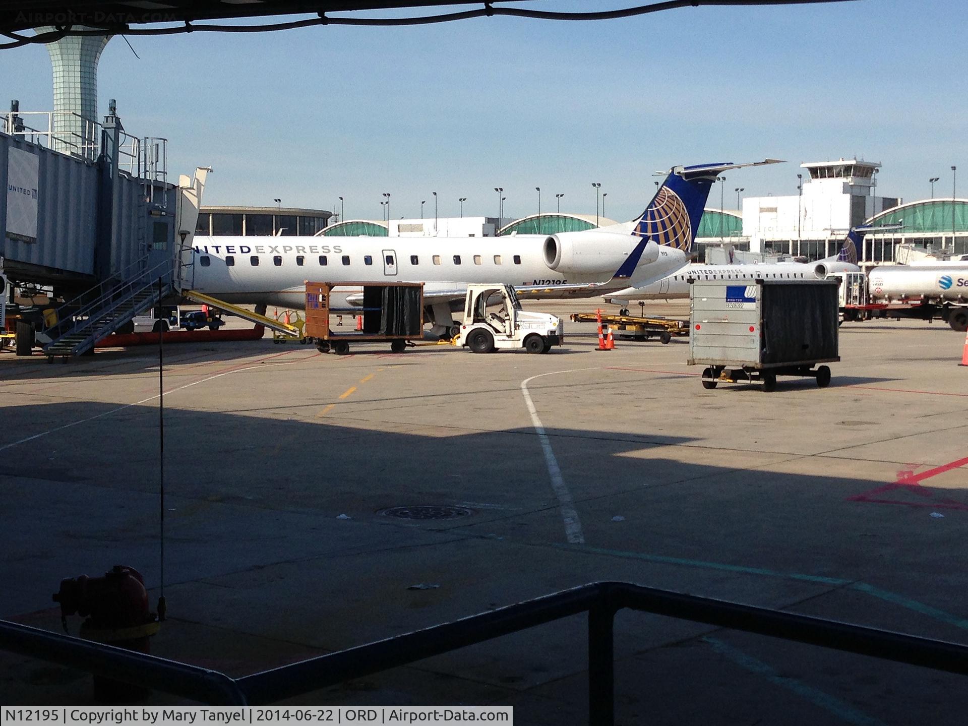 N12195, 2005 Embraer ERJ-145XR (EMB-145XR) C/N 14500943, @ gate @ ORD