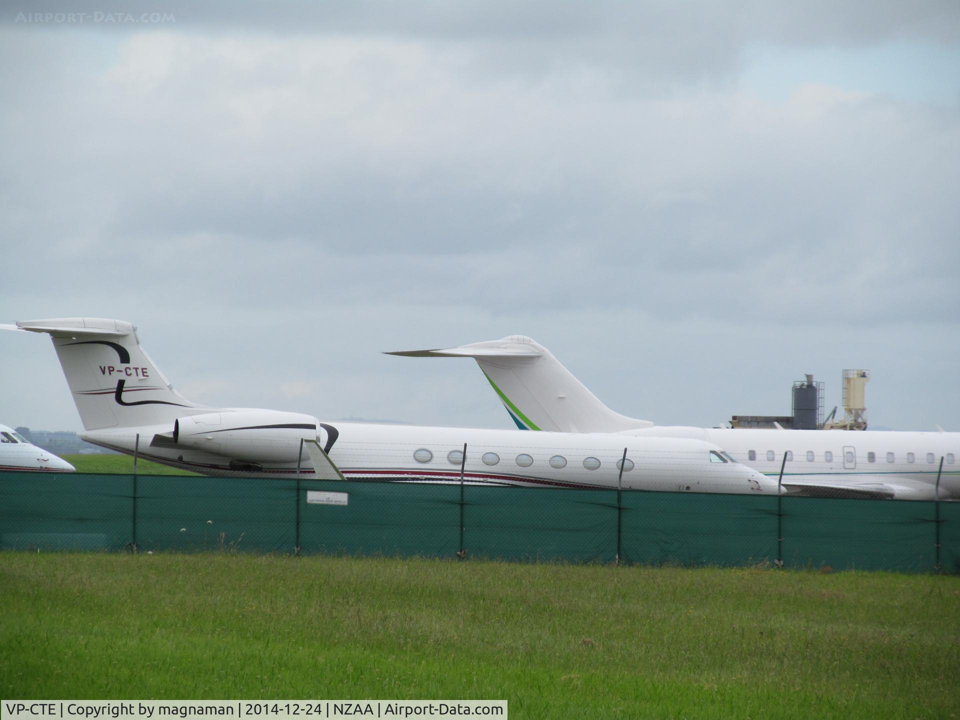 VP-CTE, Gulfstream Aerospace GV-SP (G550) C/N 5304, Not best of photos but this was one of five temporarily stored on a taxiway.