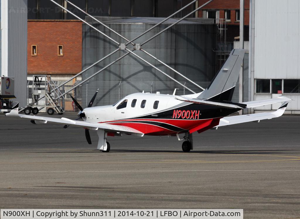 N900XH, 2014 Socata TBM-900 C/N 1019, Parked at the General Aviation area...