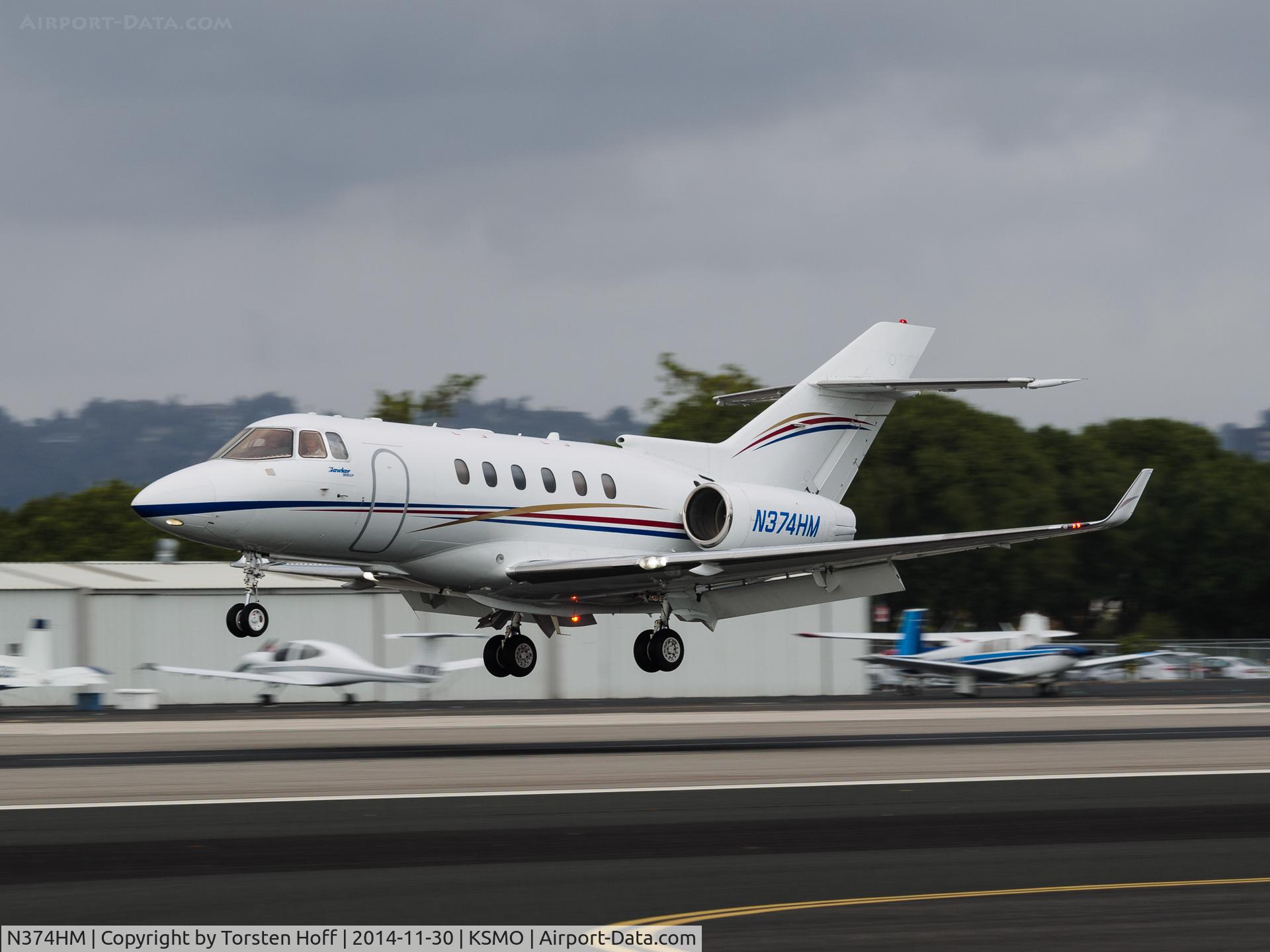 N374HM, 2009 Hawker Beechcraft 900XP C/N HA-0112, N374HM arriving on RWY 21
