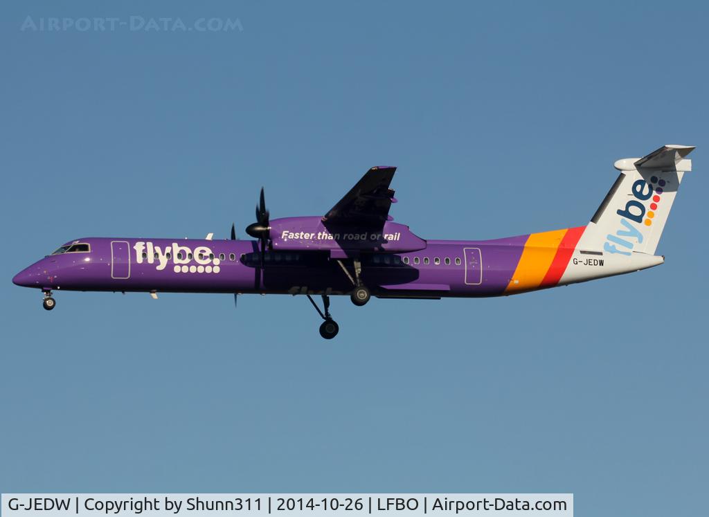 G-JEDW, 2004 De Havilland Canada DHC-8-402Q Dash 8 C/N 4093, Landing rwy 32L in new c/s