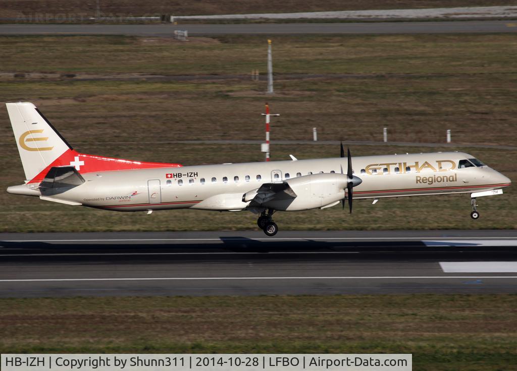 HB-IZH, 1994 Saab 2000 C/N 2000-011, Landing rwy 14R