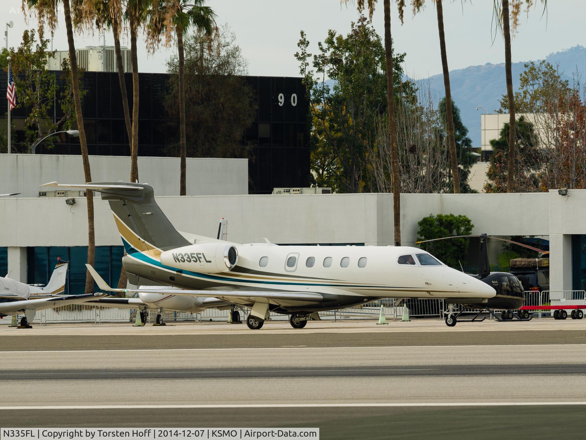 N335FL, 2012 Embraer EMB-505 Phenom 300 C/N 50500115, N335FL taxiing