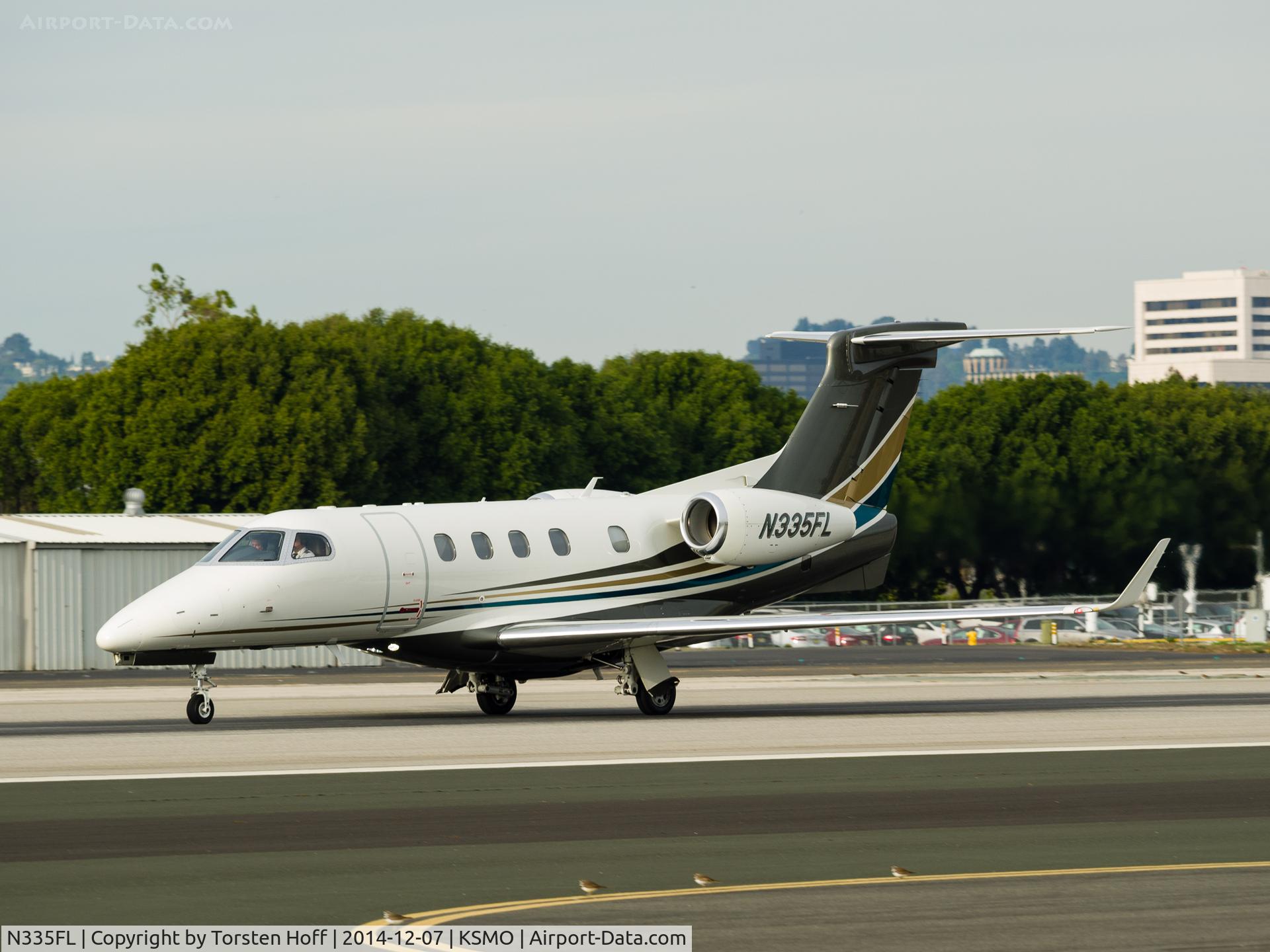 N335FL, 2012 Embraer EMB-505 Phenom 300 C/N 50500115, N335FL departing from RWY 21