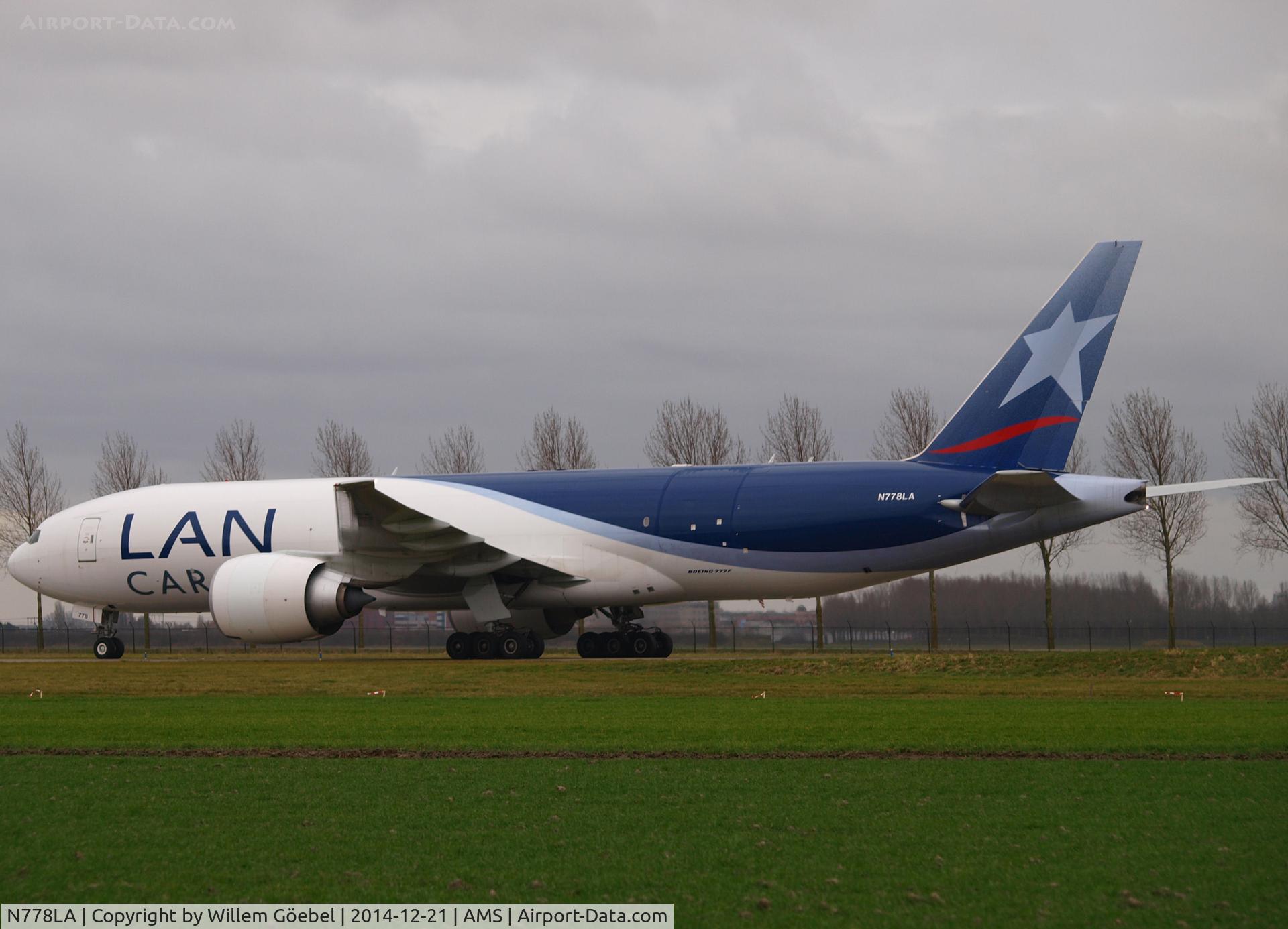 N778LA, 2012 Boeing 777-F6N C/N 41518, Taxi from runway 18R to the gate of Schiphol Airport