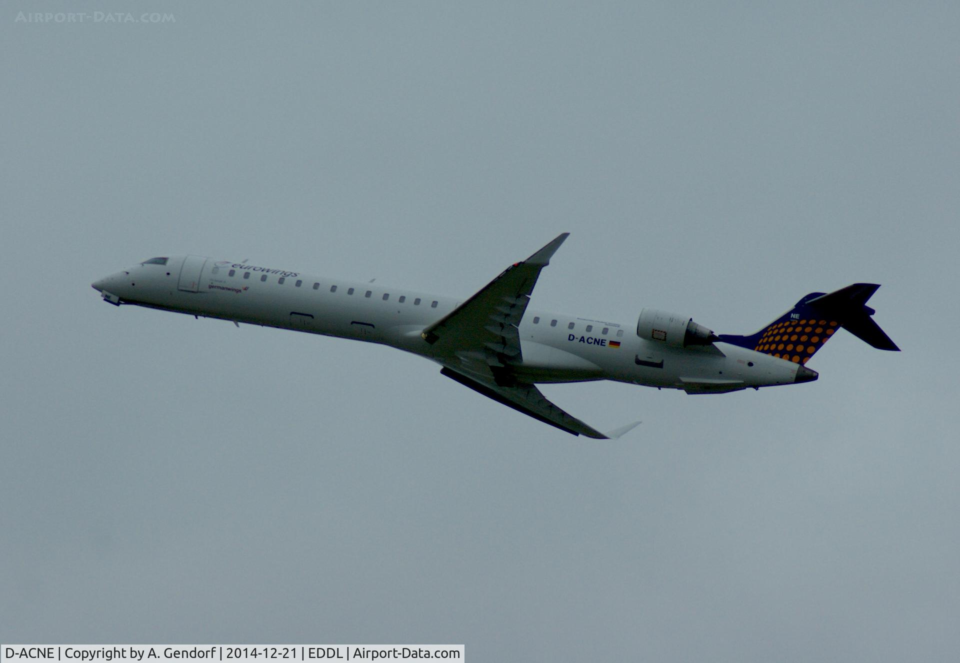 D-ACNE, 2009 Bombardier CRJ-900ER (CL-600-2D24) C/N 15241, Eurowings (operating for germanwings sticker), is here climbing out at Düsseldorf Int'l(EDDL) on a grey winter day