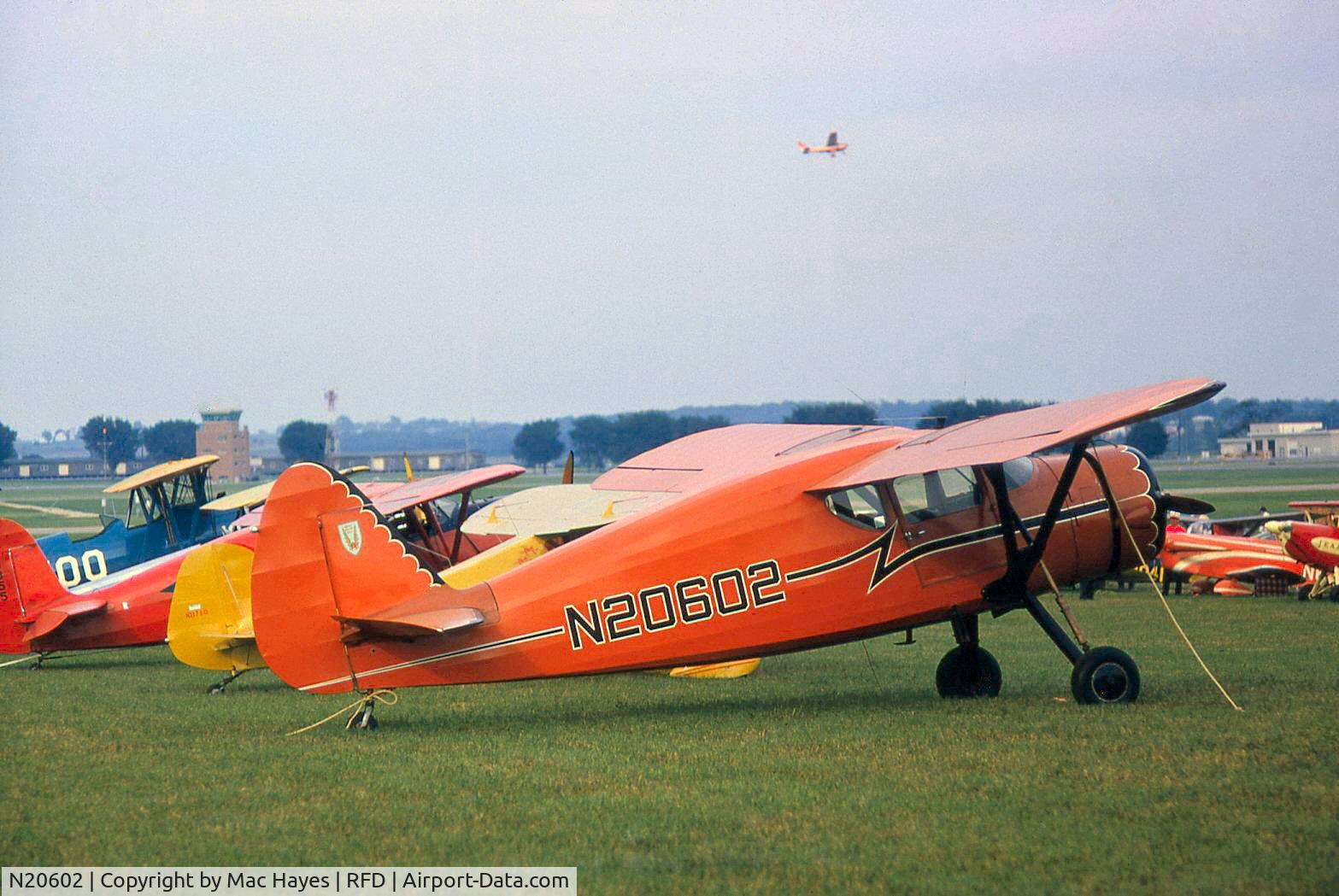 N20602, 1978 Beech 58P Baron C/N TJ-173, S/N belongs to a BE58 now. This was a 1938 Fairchild 24 G or maybe K, radial engine. Taken in Aug, 1964, EAA fly-in, Rockford, IL, USA.