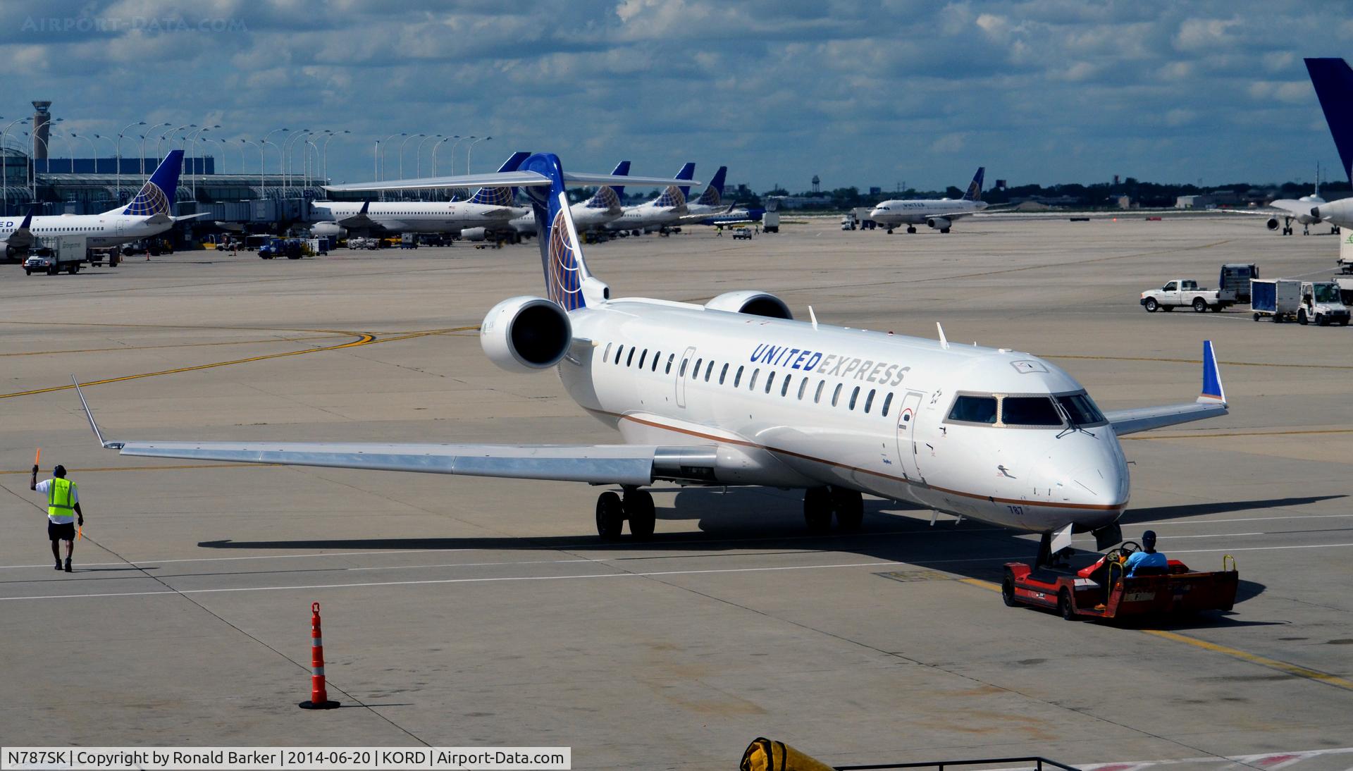 N787SK, 2009 Bombardier CRJ-700 (CL-600-2C10) Regional Jet C/N 10288, Pushback O'Hare