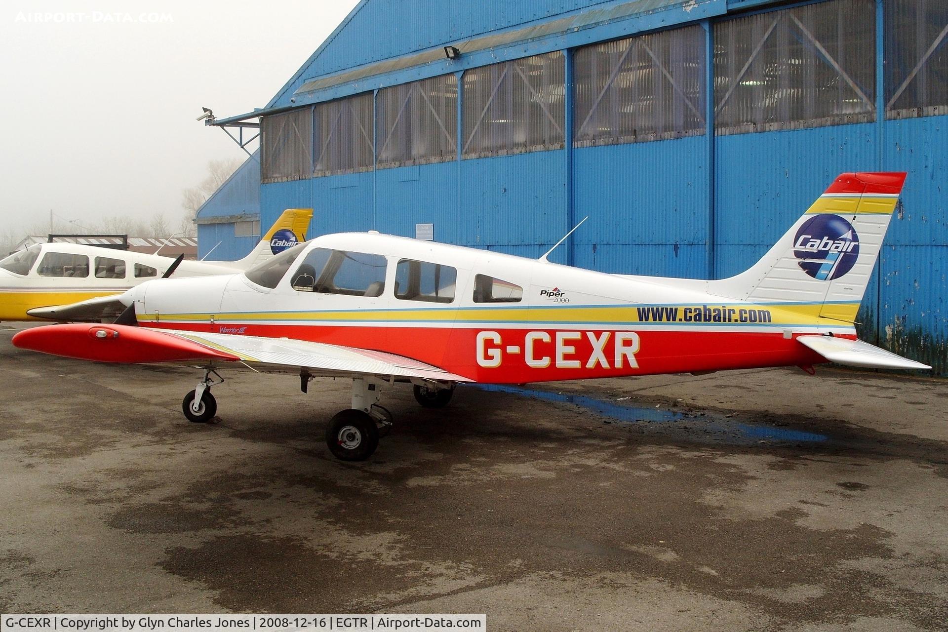 G-CEXR, 2000 Piper PA-28-161 Cherokee Warrior III C/N 2842076, Taken on a quiet cold and foggy day. With thanks to Elstree control tower who granted me authority to take photographs on the aerodrome. Previously N70FT. Operated by Cabair.