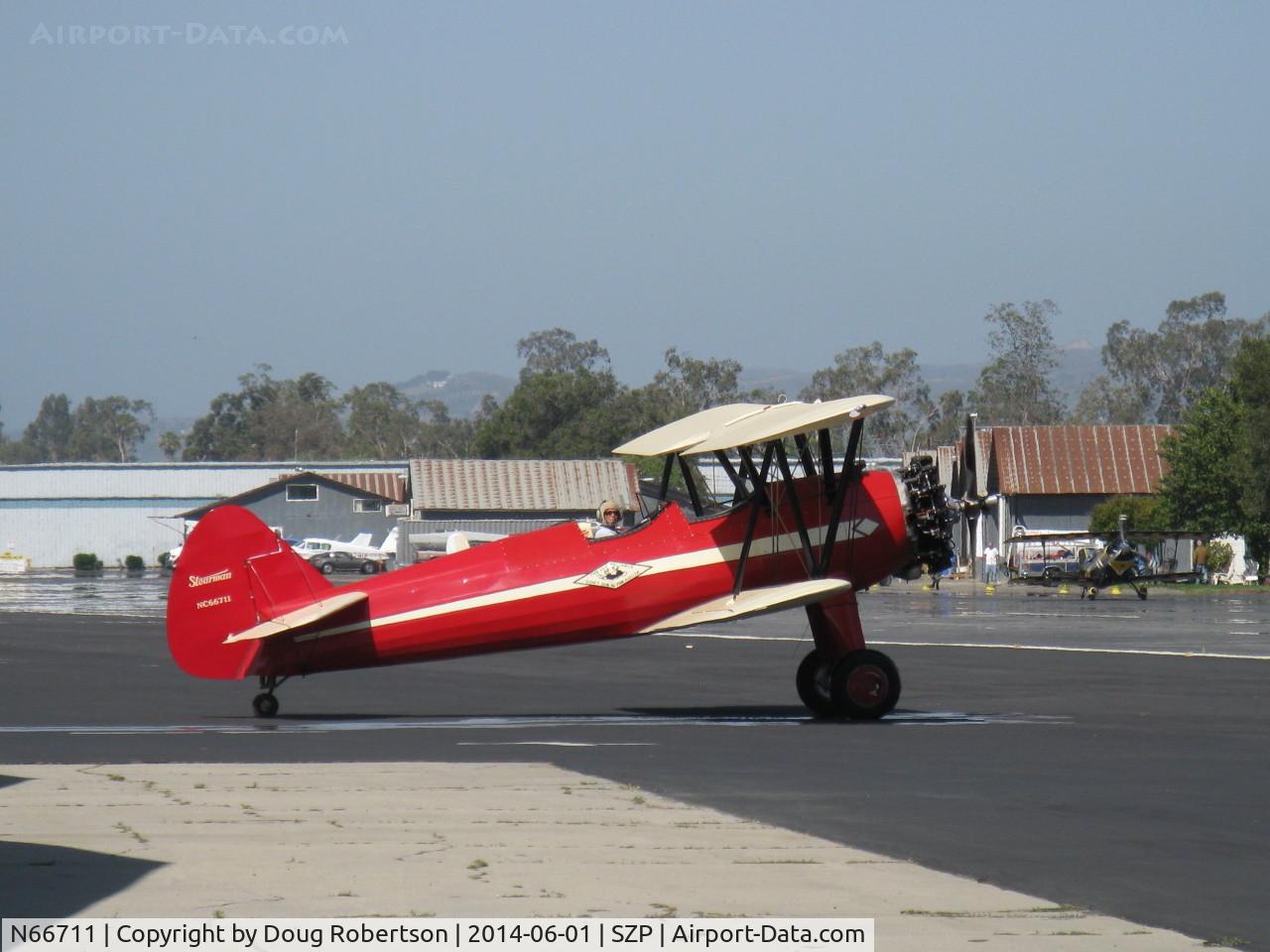 N66711, 1941 Boeing IB75A C/N 75-1675, 1941 Boeing Stearman IB75A, Jacobs R755B2 275 Hp upgrade, Experimental class, about to cross Rwy 22