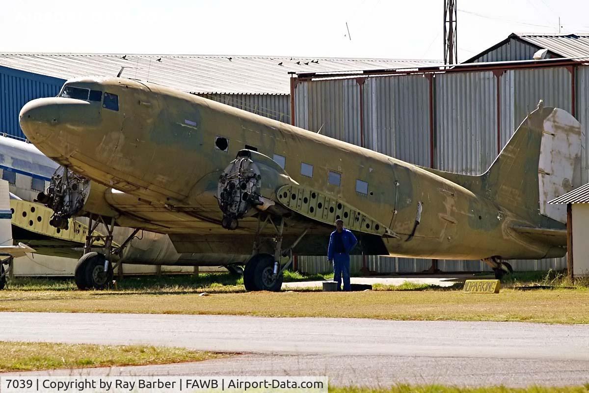 7039, 1945 Douglas DC-3  (C-47B-25-DK) C/N 15903/32651, Douglas DC-3C-47B-25-DK Dakota [15903/32651] (Zimbabwe Air Force) Pretoria-Wonderboom~ZS 19/09/2006. Stored awaiting turbo prop conversion.