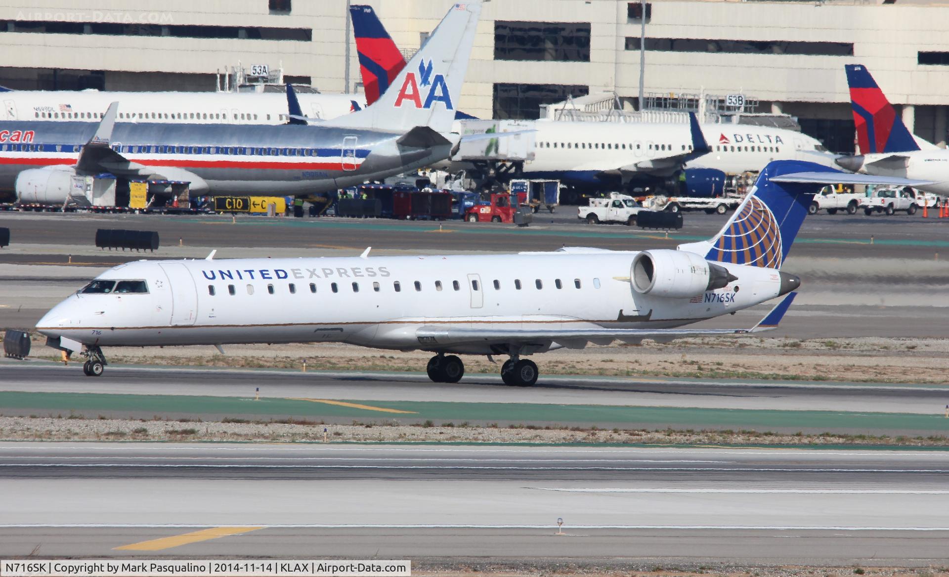N716SK, 2004 Bombardier CRJ-701ER (CL-600-2C10) Regional Jet C/N 10180, CL-600-2C10