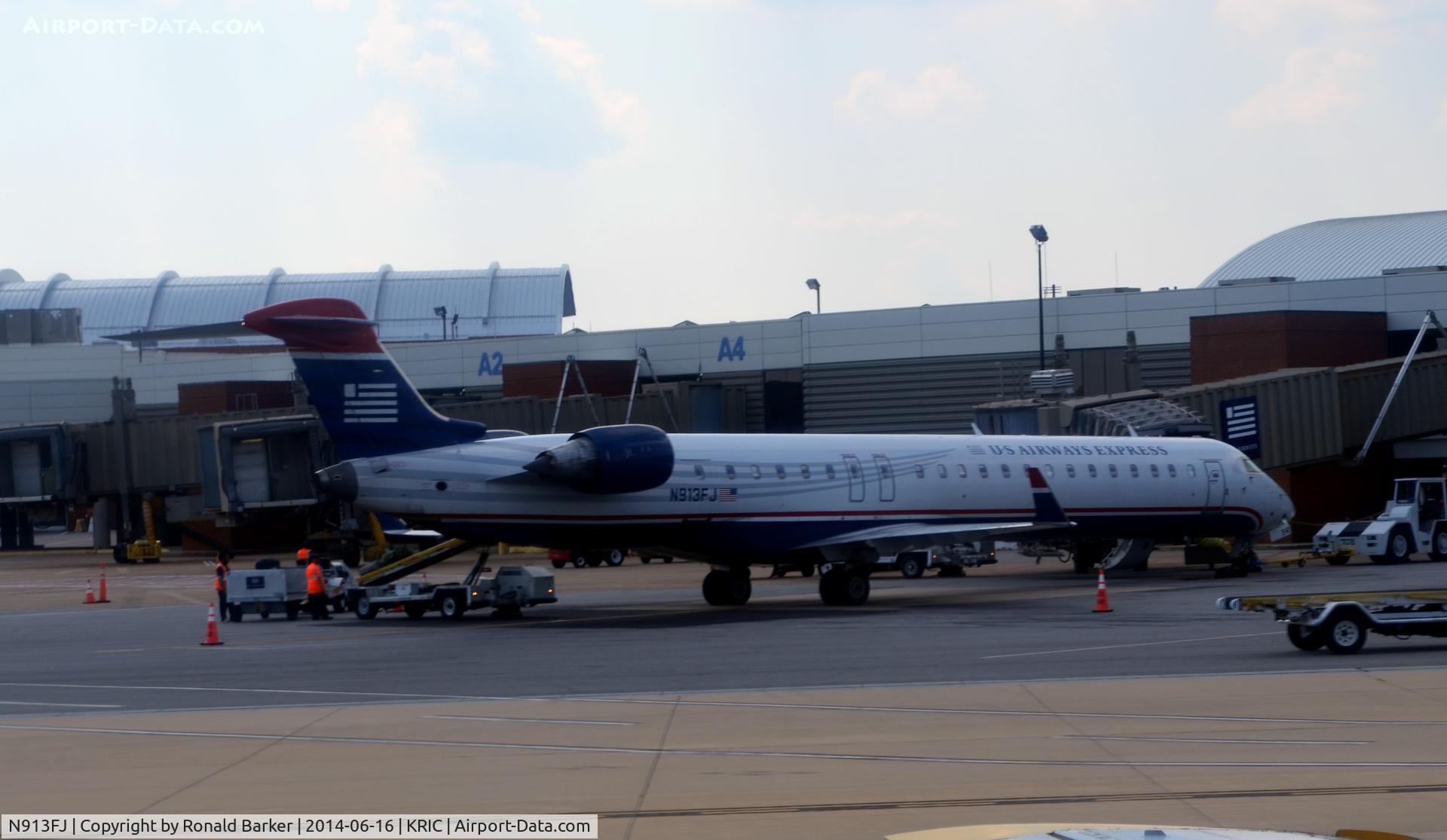 N913FJ, 2004 Bombardier CRJ-900ER (CL-600-2D24) C/N 15013, Gate A6 Richmond