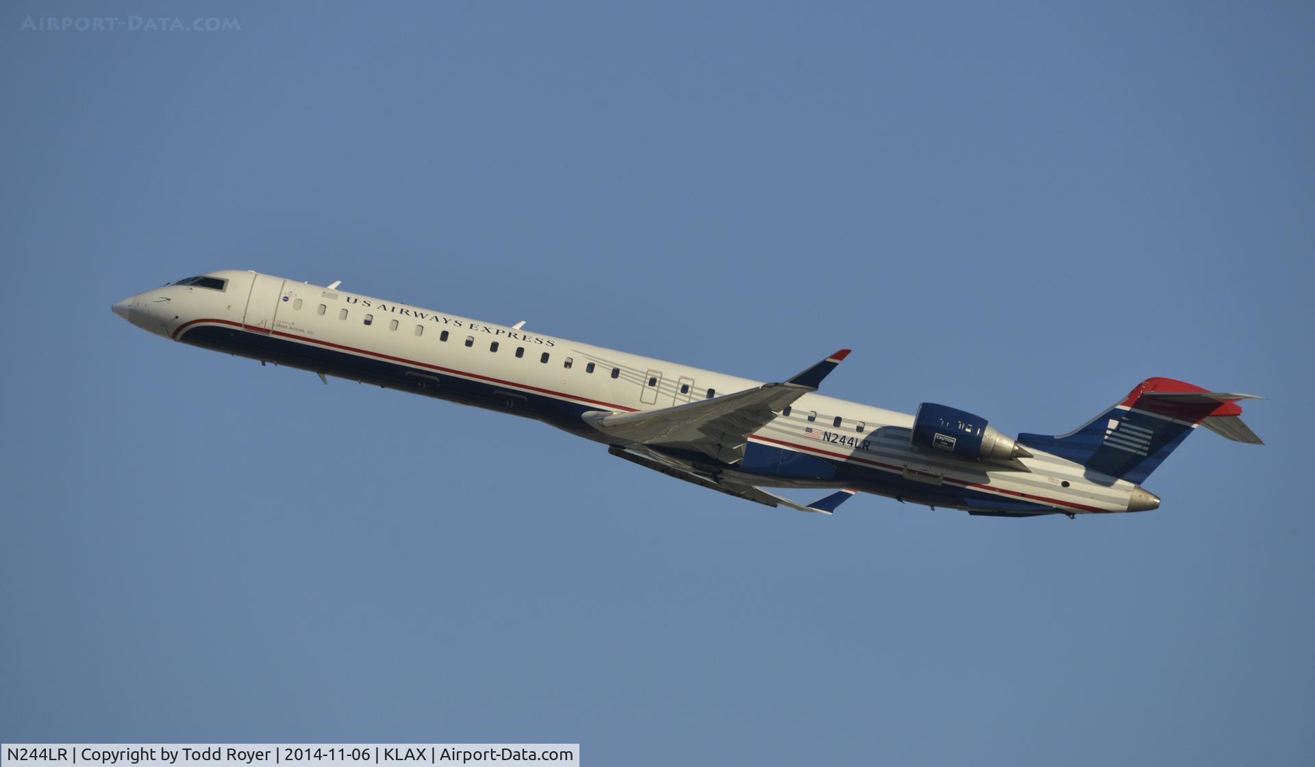 N244LR, 2009 Bombardier CRJ-900LR (CL-600-2D24) C/N 15233, Departing LAX on 25R