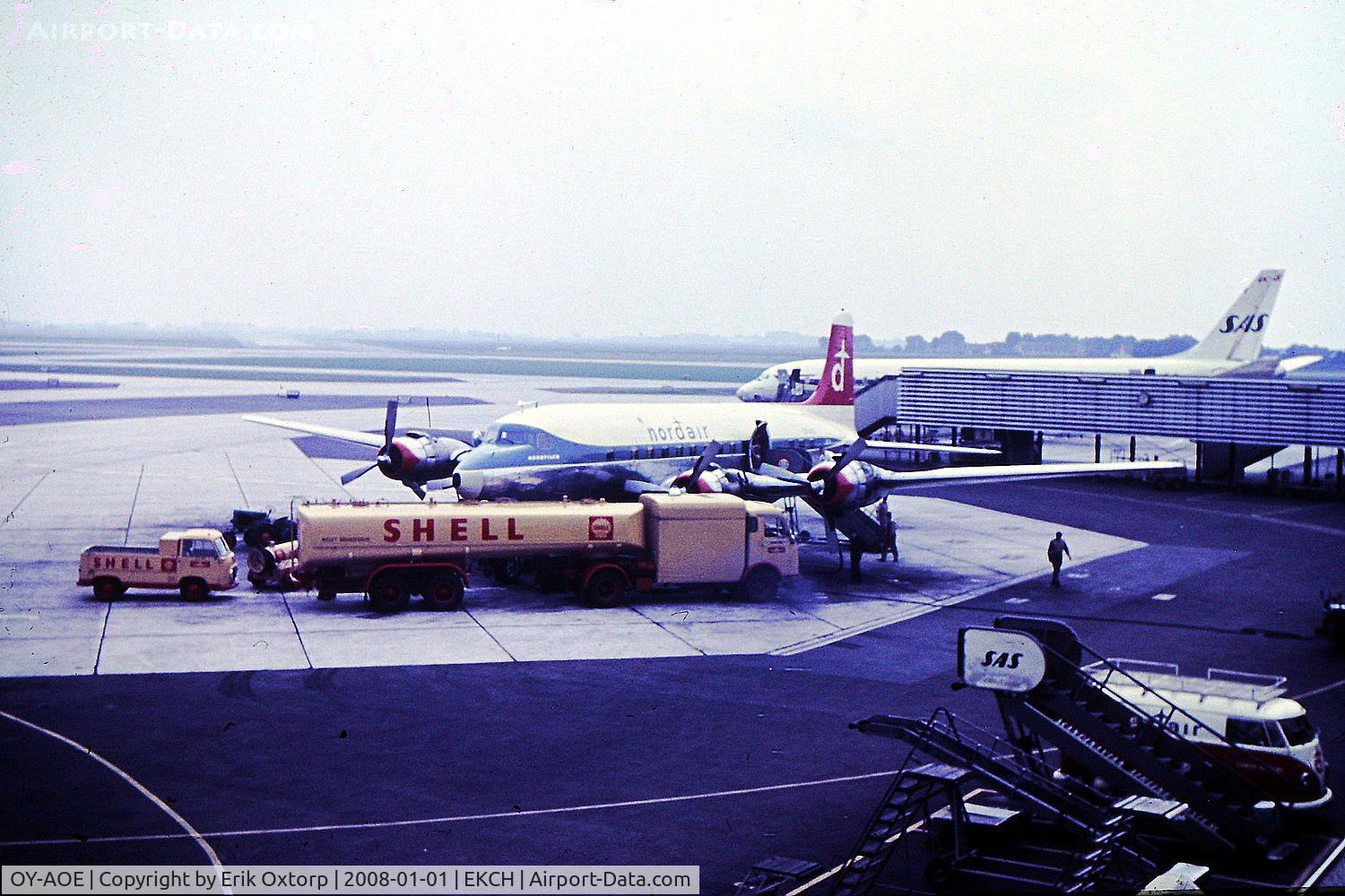 OY-AOE, 1947 Douglas DC-6 C/N 42883, OY-AOE parked at A7. Photo taken in the early 60's.