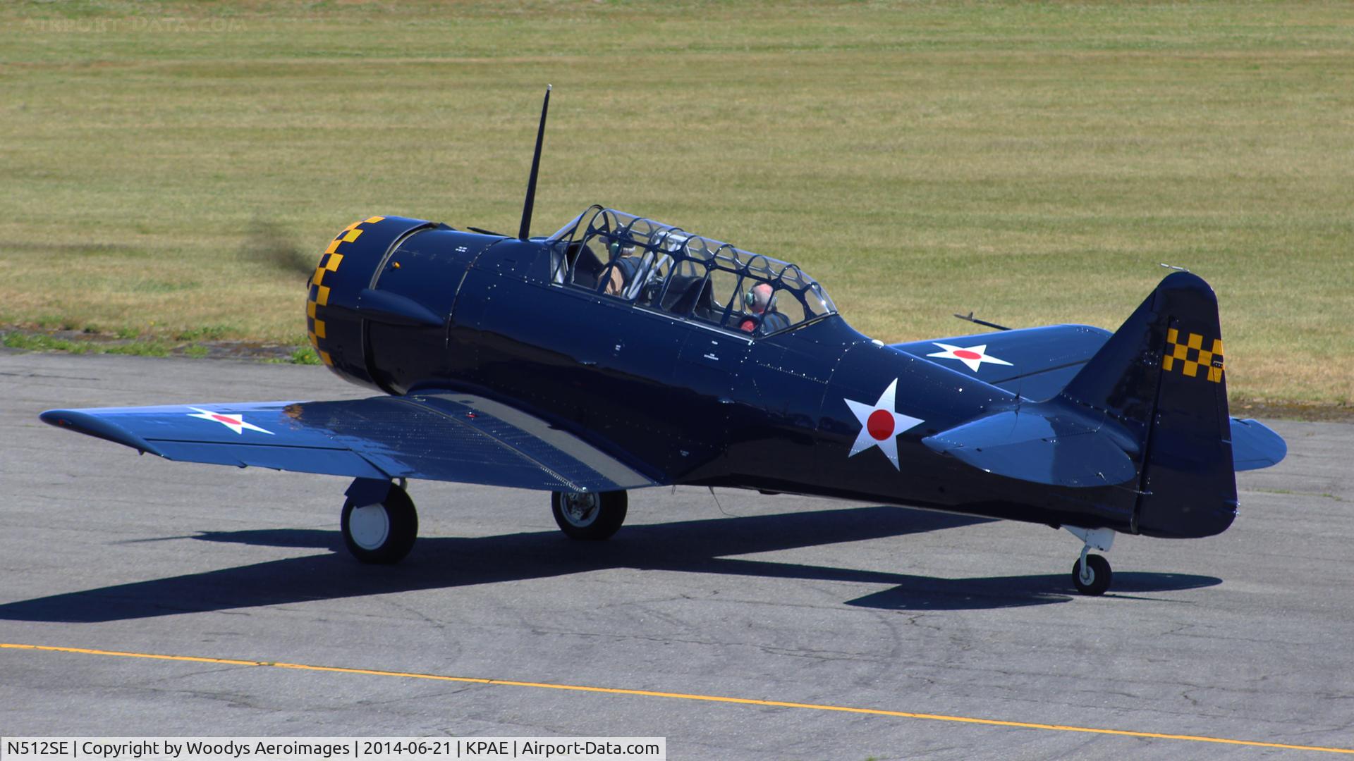 N512SE, 1958 North American AT-6A Texan C/N JS 88-9421, Heading out on Kilo 6 for a flight.