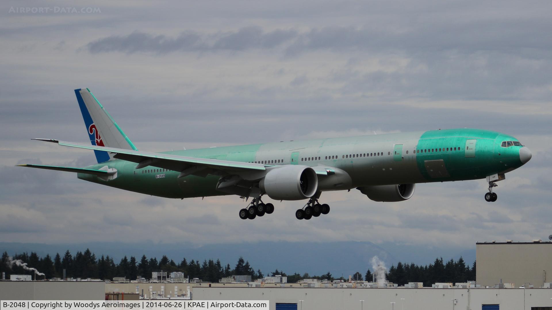 B-2048, 1914 Boeing 777-31B/ER C/N 43220, Landing on 16R after it's first flight.