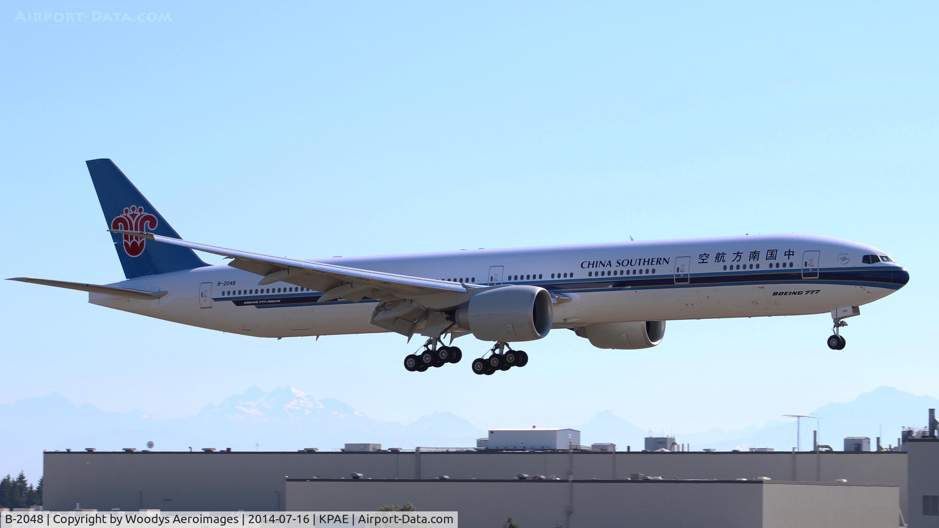 B-2048, 1914 Boeing 777-31B/ER C/N 43220, Arriving on 16R after a test flight.
