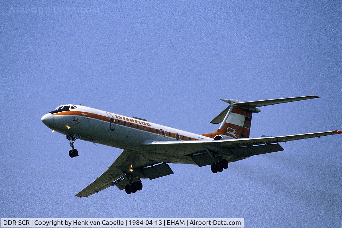 DDR-SCR, 1974 Tupolev Tu-134A C/N 4352206, Interflug Tu-134 in smoky approach to Schiphol airport, the Netherlands