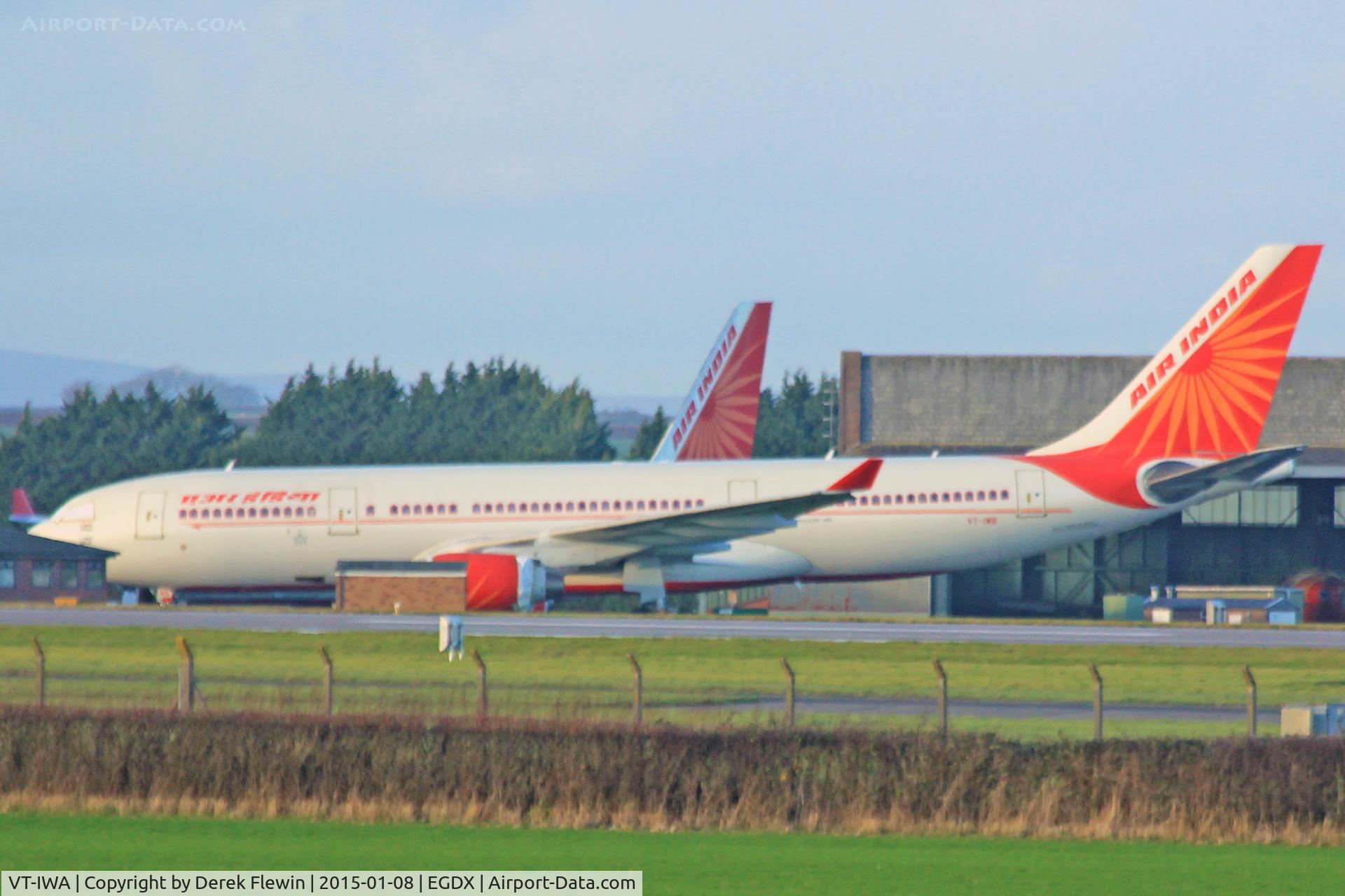 VT-IWA, 2000 Airbus A330-223 C/N 353, A330-223, Air India, previously F-WWYN, SE-RBF, F-WQVY, arrived 25/11/14, seen at ECube Solutions MOD St Athan, sister ac VT-IWB in background.