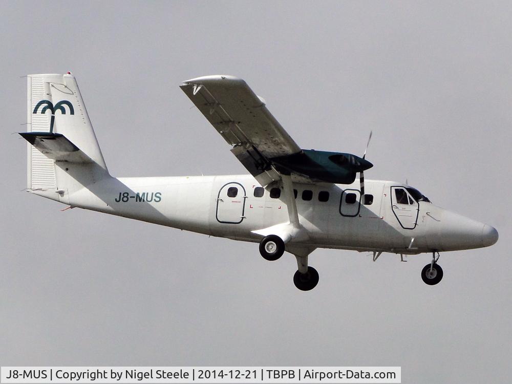 J8-MUS, 1977 De Havilland Canada DHC-6-300 Twin Otter C/N 553, J8-MUS on short final to rwy 09 @ TBPB