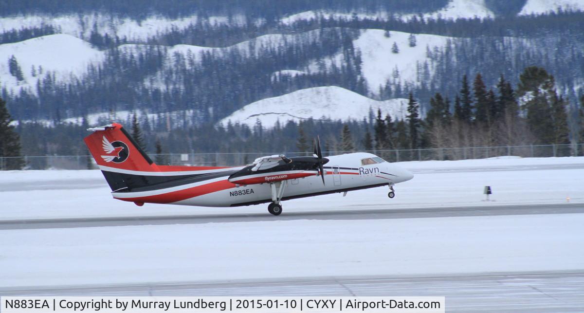 N883EA, 1991 De Havilland Canada DHC-8-106 Dash 8 C/N 260, First photo of N883EA with its new Ravn livery, as it passed through Whitehorse, Yukon.