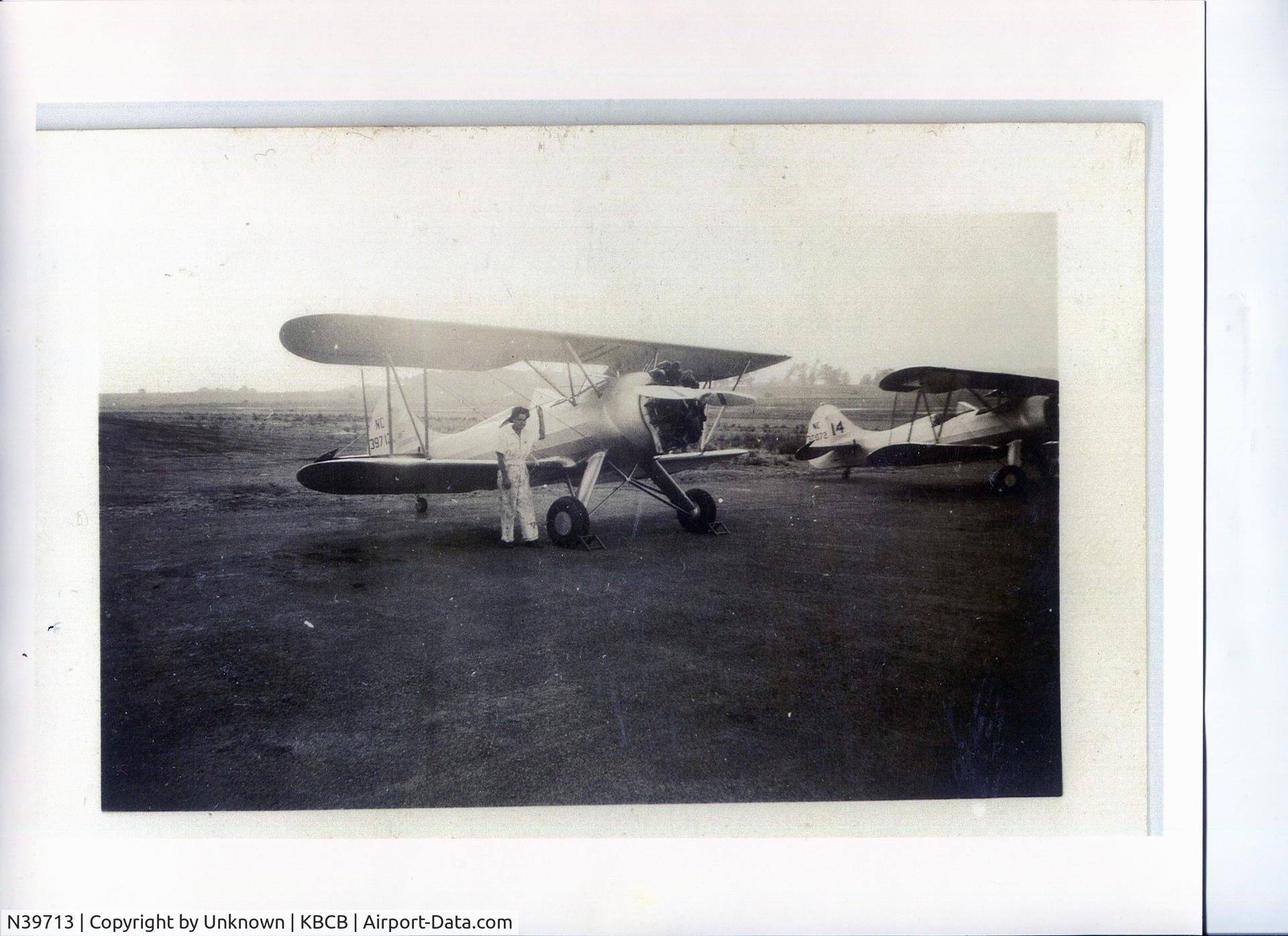 N39713, 1942 Waco UPF-7 C/N 5846, 1942 VPI airport Blacksburg, VA.  Mechanic, pilot Charlie Kulp
