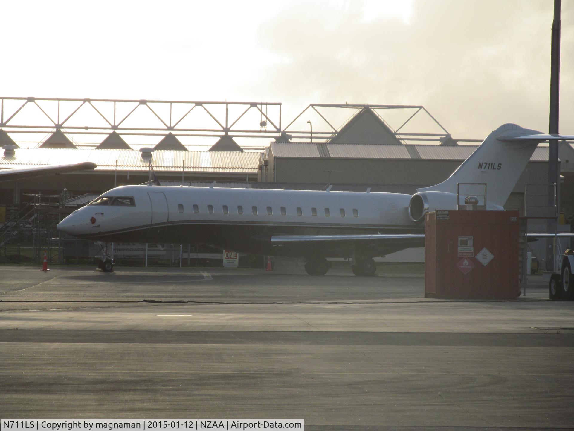N711LS, 2012 Bombardier BD-700-1A10 Global 6000 C/N 9476, Into evening sun on convair apron