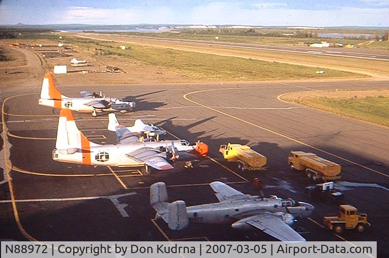 N88972, 1943 North American B-25D Mitchell C/N 100-23644, Firefighters on airfield at Galena Airport, Alaska around 1970