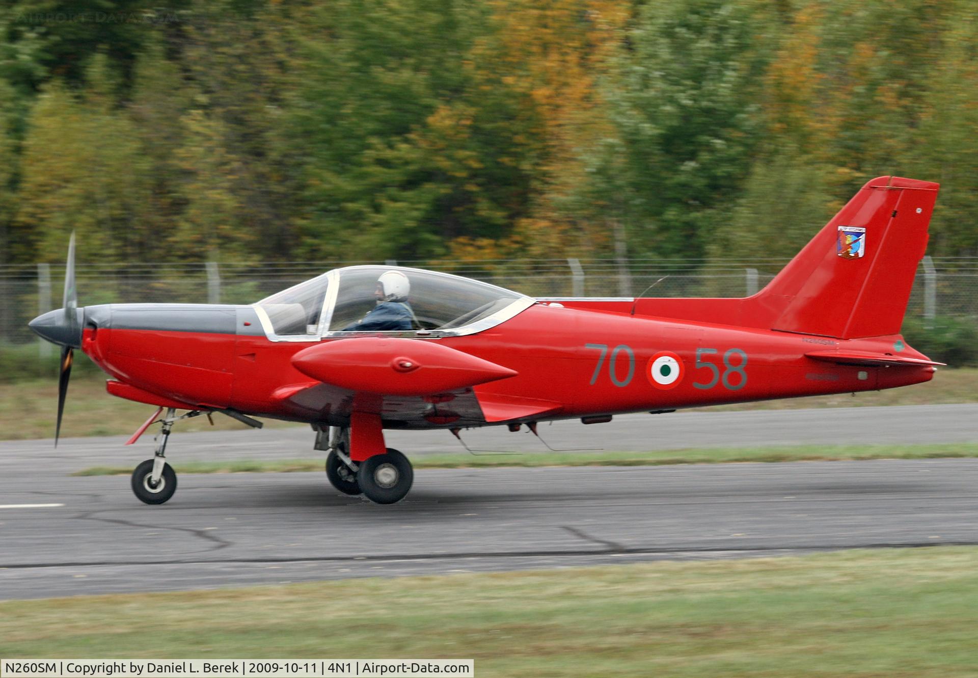 N260SM, 1970 SIAI-Marchetti F-260 C/N 2-40, This color would also look good on an Alfa-Romeo Spyder - an Italian beauty, una machina sportiva, taxies by.