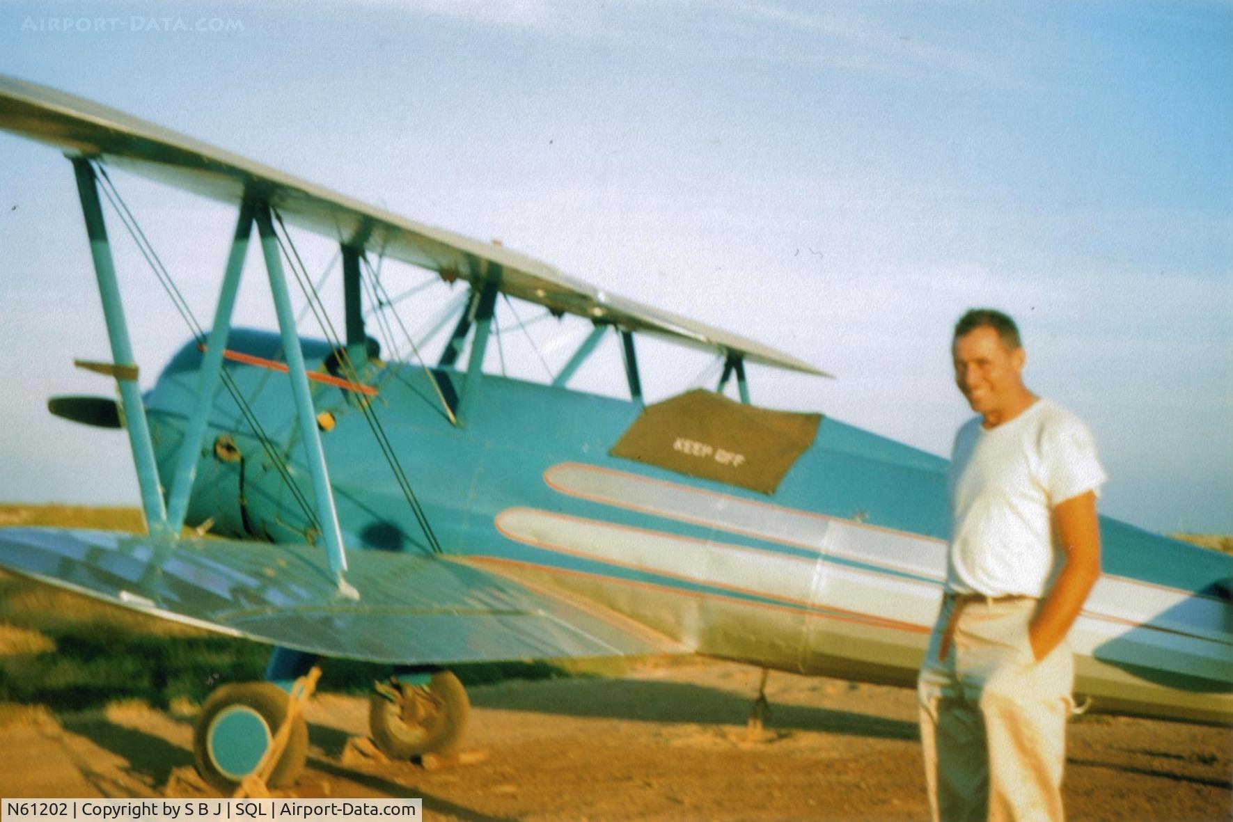 N61202, 1943 Boeing IB75A C/N 75-7009, N61202 around 1960 at the San Carlos airport in Calif with my dad remembering the good old days.