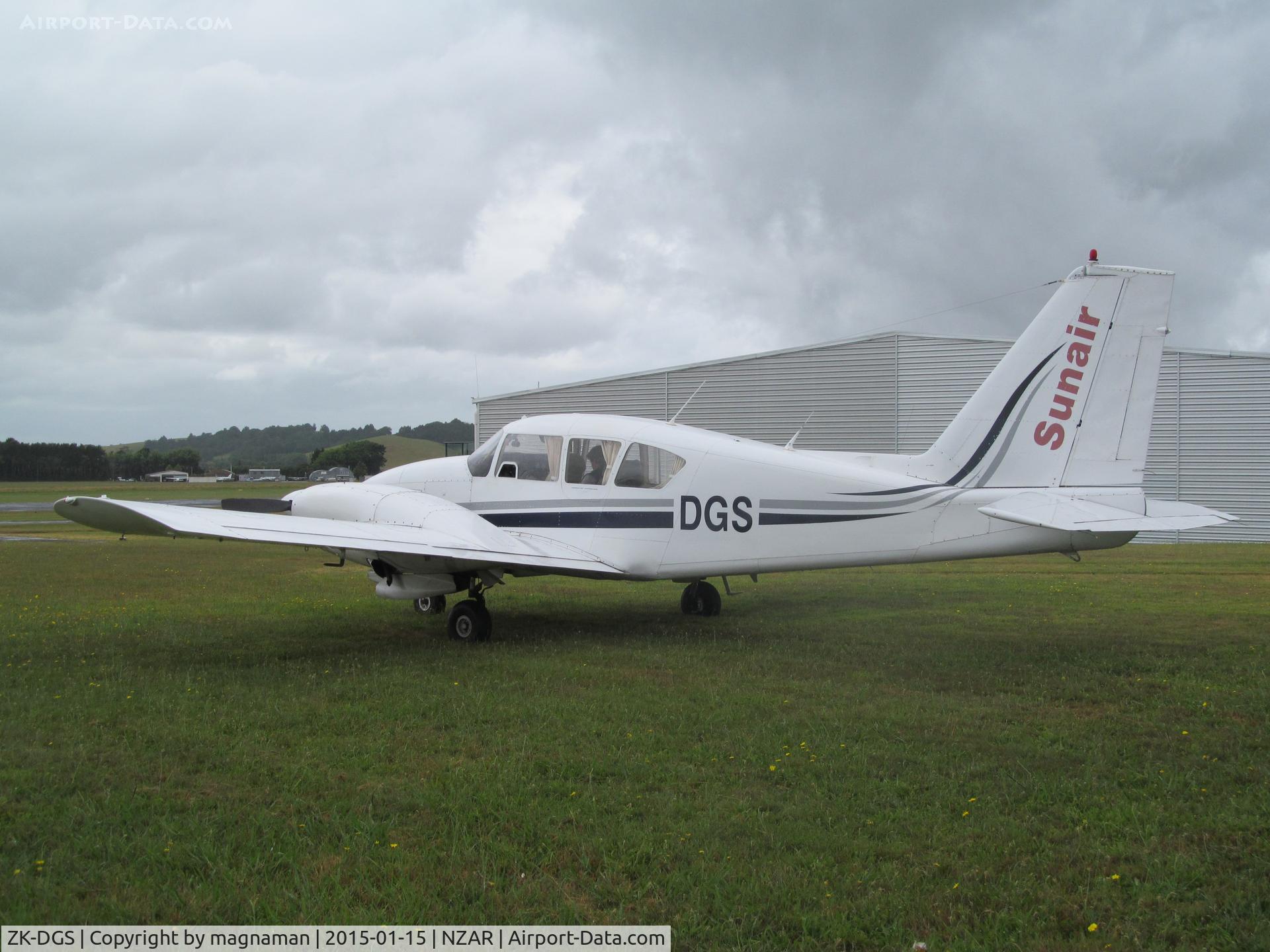 ZK-DGS, Piper PA-23-250 C/N 27-7304959, on grass at ardmore