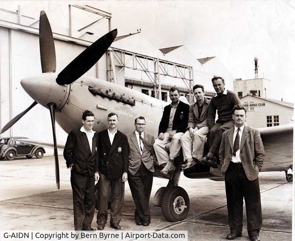 G-AIDN, 1944 Supermarine 502 Spitfire TR.8 (LF.VIIIc) C/N 6S/729058, Hampshire Aero Club's Spitfire (G-AIDN) ready for flight at their Eastleigh Aerodrome base. Left to Right; Fred Botley, Jack Adlam, Bernie Byrne, Den Dewey, Jack Stutchbury, Cyril Foster.